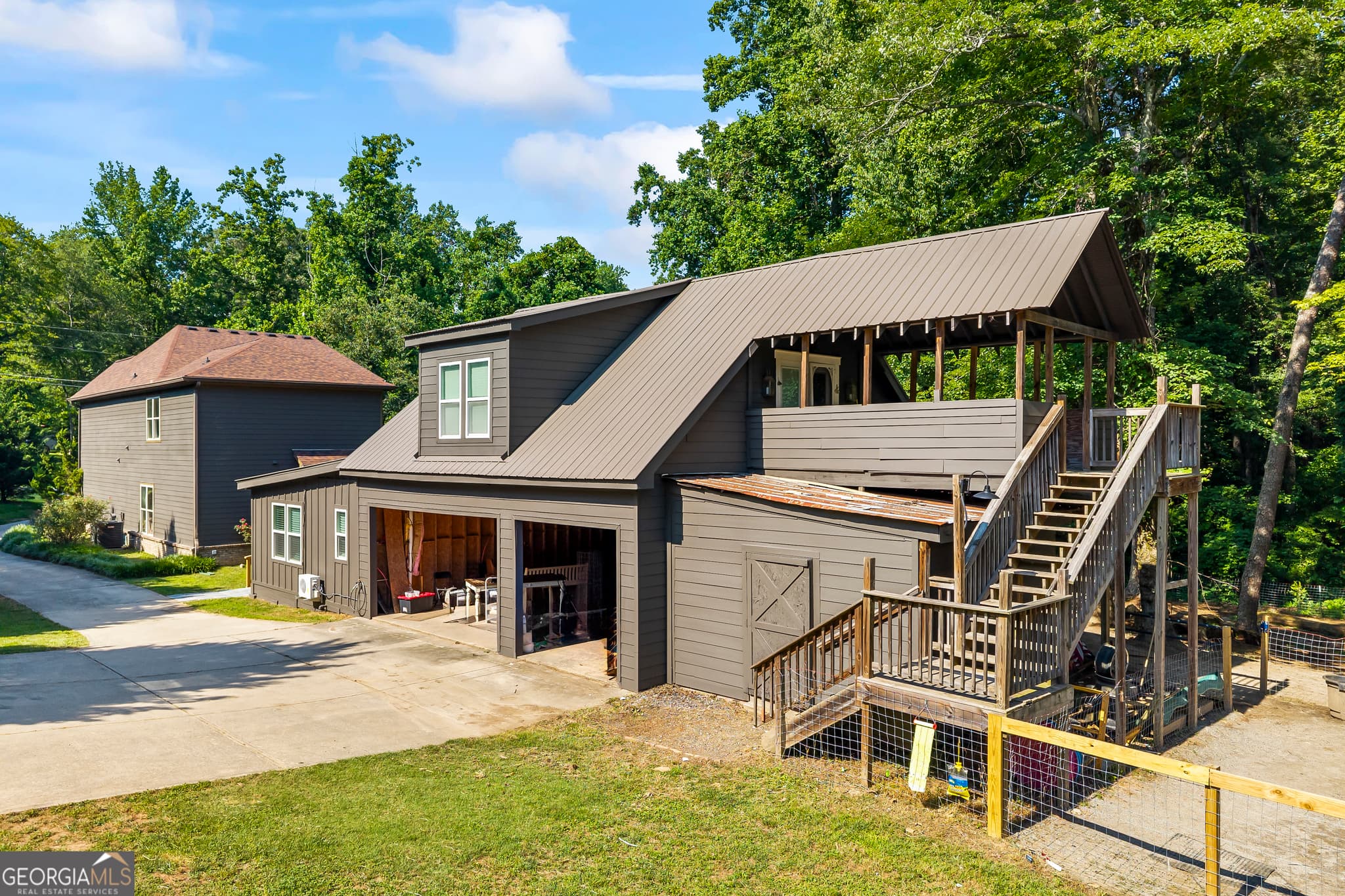 7 bedroom, 6.5 bathroom, 3,171 sq ft single family residence for sale at 9315 Meadowbrook Drive, Gainesville, GA 30506 — photo 9