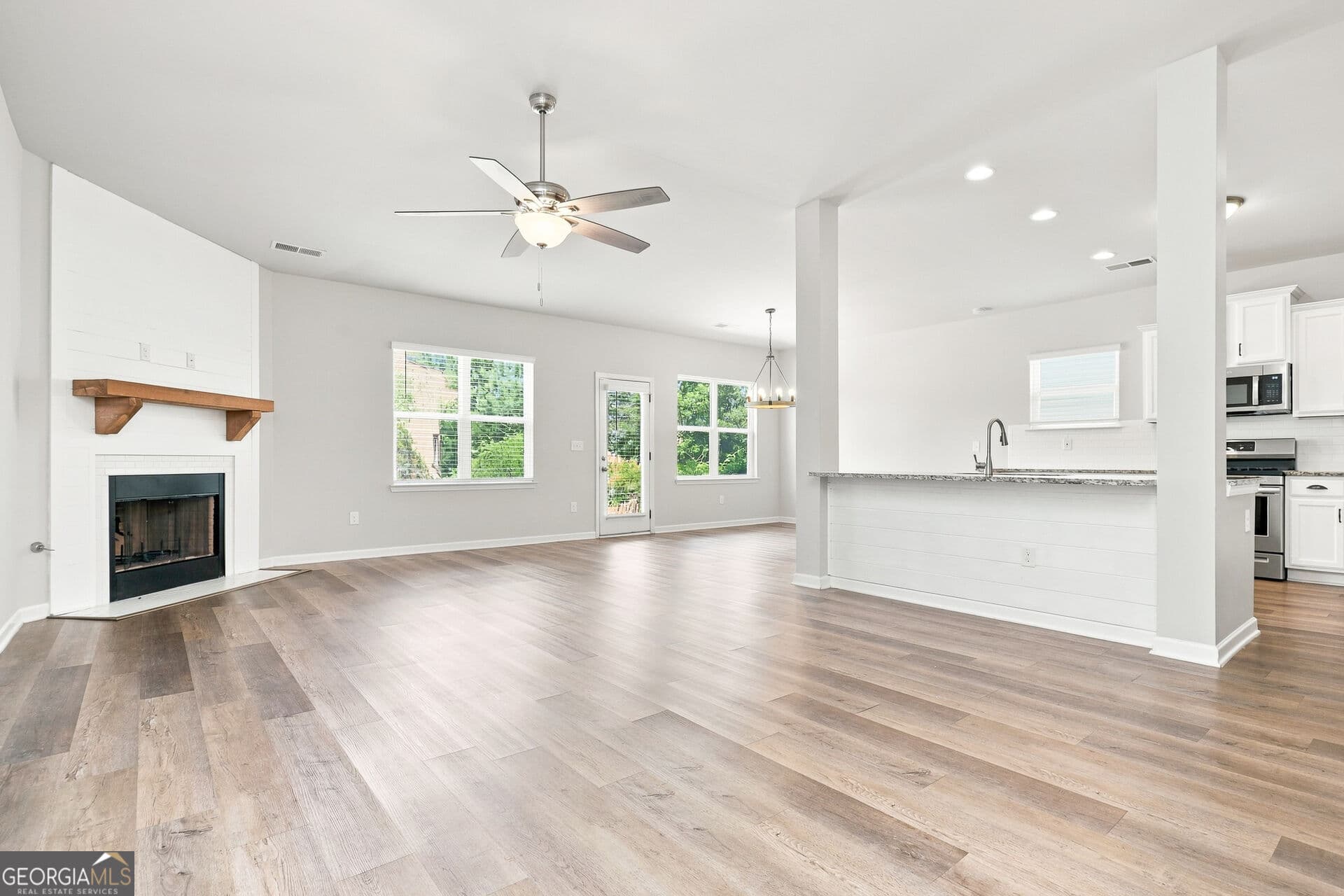 4 bedroom, 3 bathroom, 2,453 sq ft single family residence for sale at 319 San Anselmo Street, Locust Grove, GA 30248 — photo 4