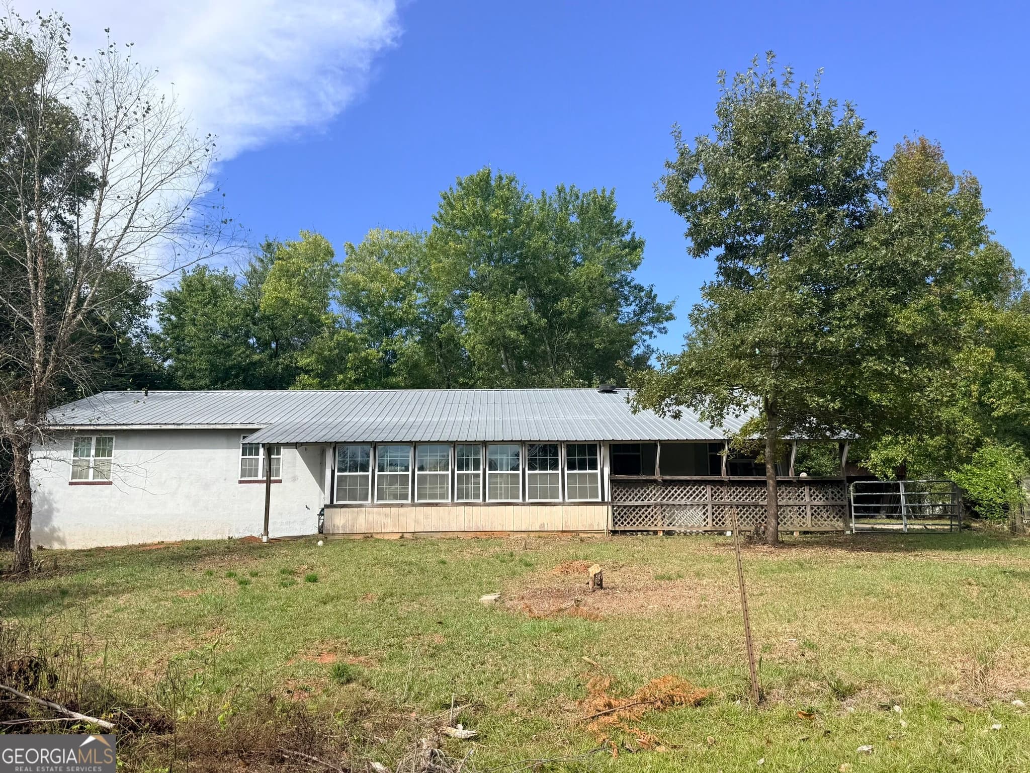3 bedroom, 2 bathroom, 2,356 sq ft single family residence for sale at 1050 Scott Branch Road, Williamson, GA 30292