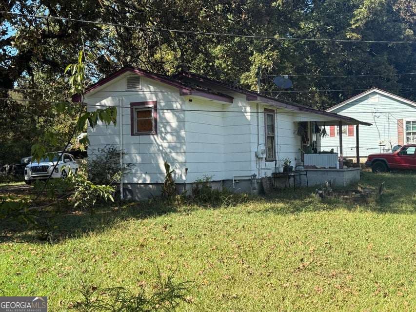 3 bedroom, 1 bathroom, 1,628 sq ft single family residence for sale at 64 Hartline Hill Road, Summerville, GA 30747 — photo 4