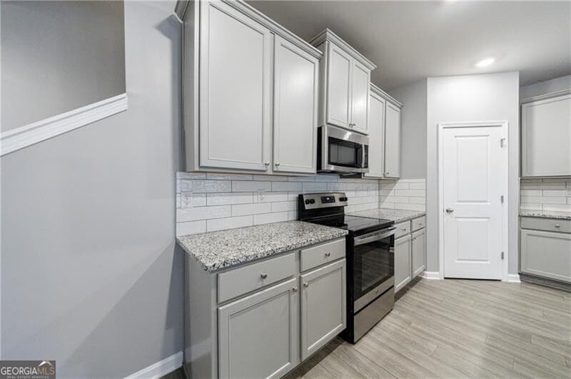 3 bedroom, 2.5 bathroom, 1,968 sq ft townhouse for sale at 3413 Endurance Court, Atlanta, GA 30349 — photo 10