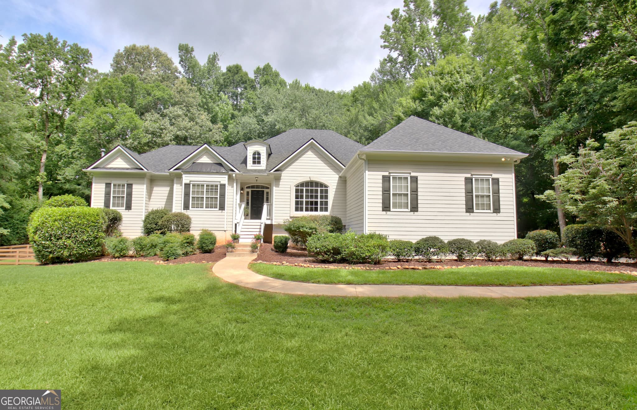 4 bedroom, 3.5 bathroom, 4,323 sq ft single family residence sold at 100 Postwood Drive, Fayetteville, GA 30215