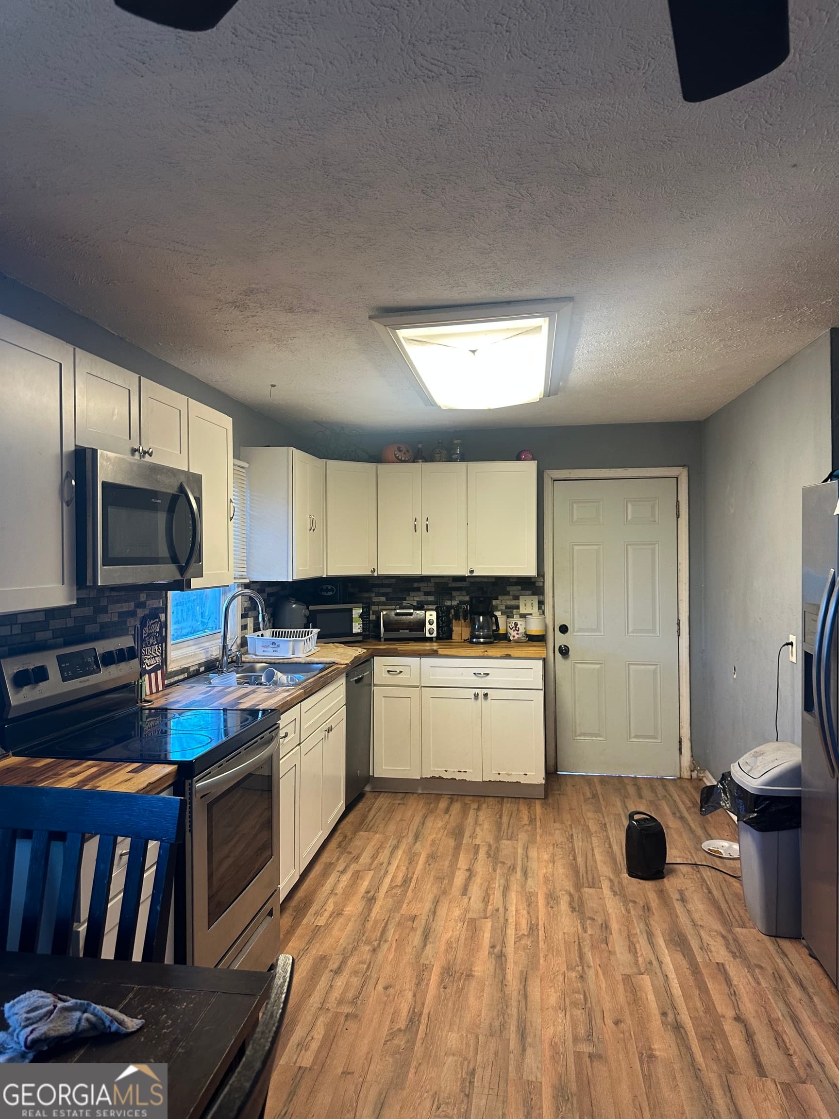 3 bedroom, 1 bathroom, 1,040 sq ft single family residence for sale at 15975 HWY 36, Covington, GA 30014 — photo 7