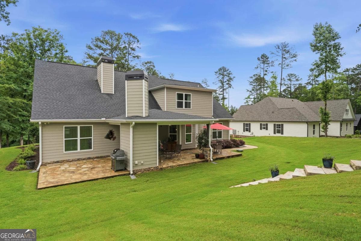 5 bedroom, 4 bathroom, 3,253 sq ft single family residence for sale at 1781 Osprey Poynte, Greensboro, GA 30642 — photo 2