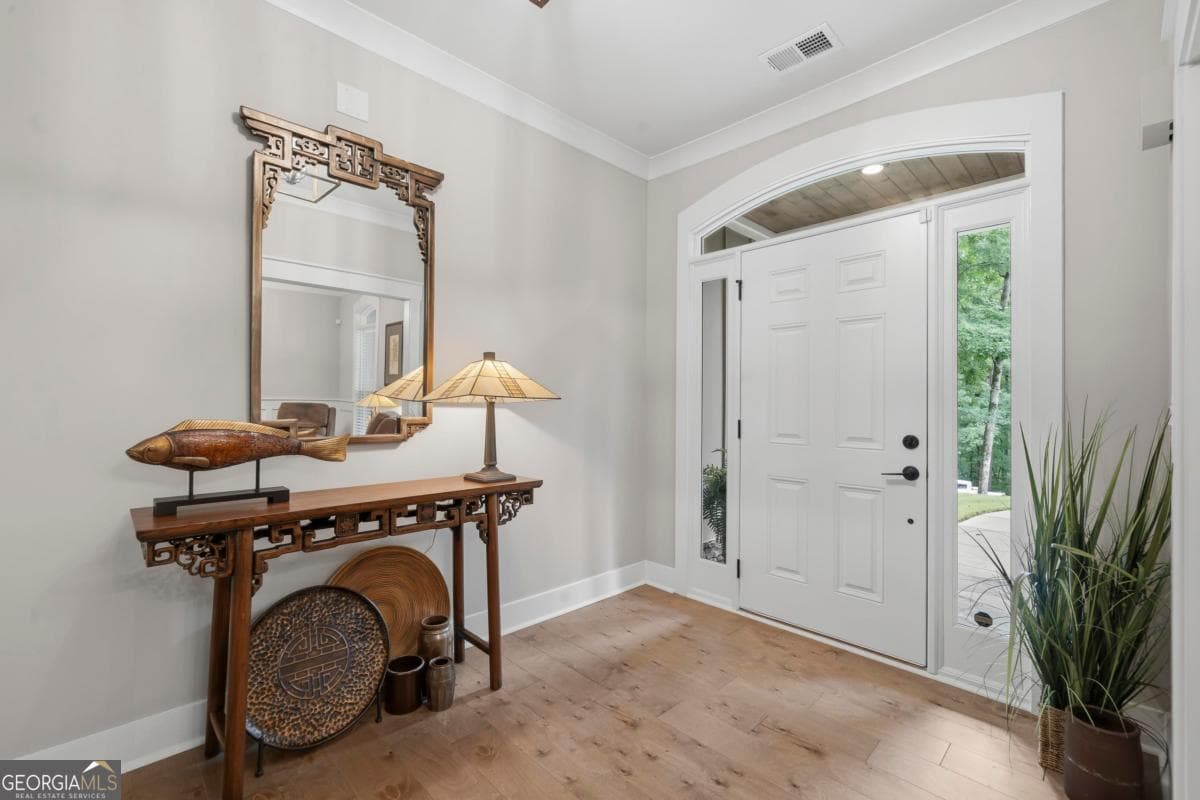 5 bedroom, 4 bathroom, 3,253 sq ft single family residence for sale at 1781 Osprey Poynte, Greensboro, GA 30642 — photo 7