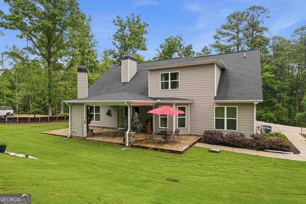 5 bedroom, 4 bathroom, 3,253 sq ft single family residence for sale at 1781 Osprey Poynte, Greensboro, GA 30642 — photo 3