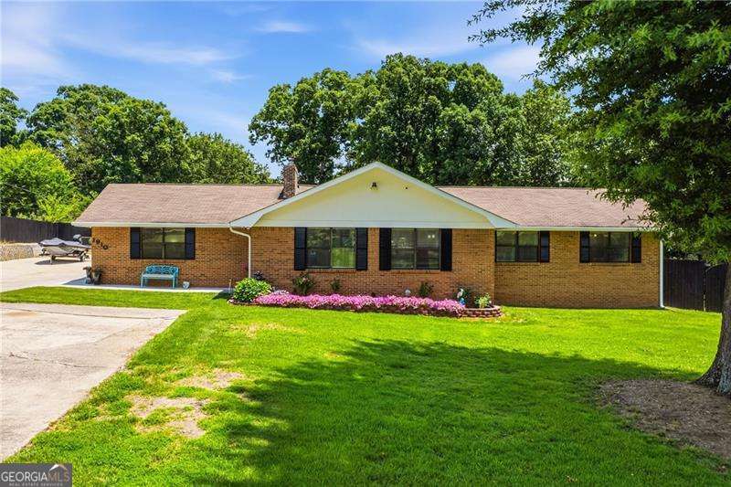 5 bedroom, 4 bathroom single family residence for sale at 1910 Mack Road, Douglasville, GA 30135 — photo 1 of 36