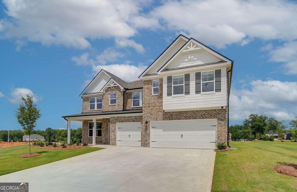 5 bedroom, 4.5 bathroom, 3,823 sq ft single family residence for sale at 708 Ripple End, Hampton, GA 30228 — photo 2
