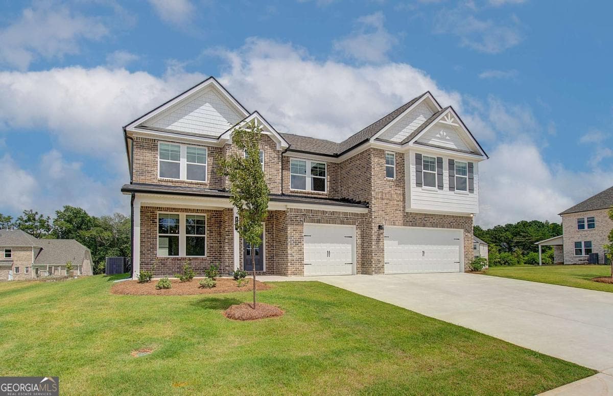 5 bedroom, 4.5 bathroom, 3,823 sq ft single family residence for sale at 708 Ripple End, Hampton, GA 30228 — photo 3