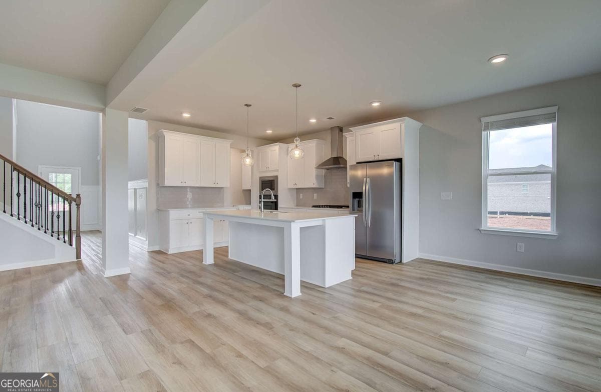 5 bedroom, 4.5 bathroom, 3,823 sq ft single family residence for sale at 708 Ripple End, Hampton, GA 30228 — photo 9