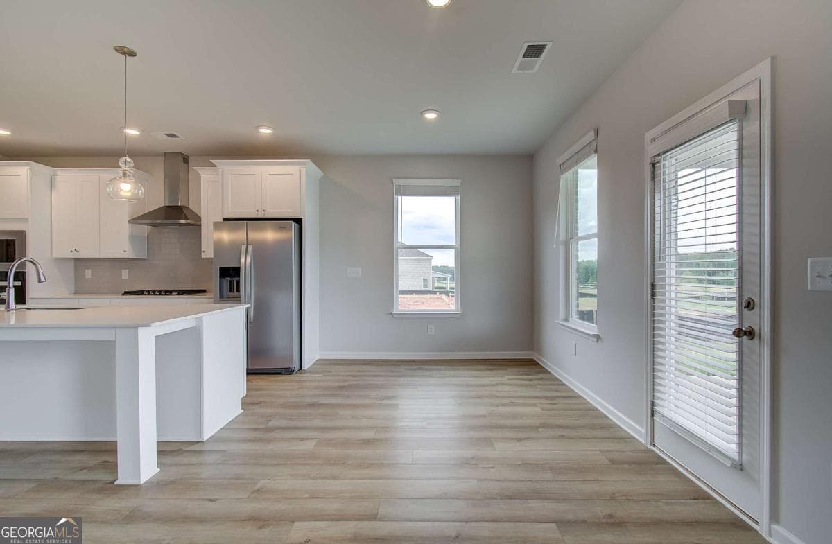 5 bedroom, 4.5 bathroom, 3,823 sq ft single family residence for sale at 708 Ripple End, Hampton, GA 30228 — photo 10