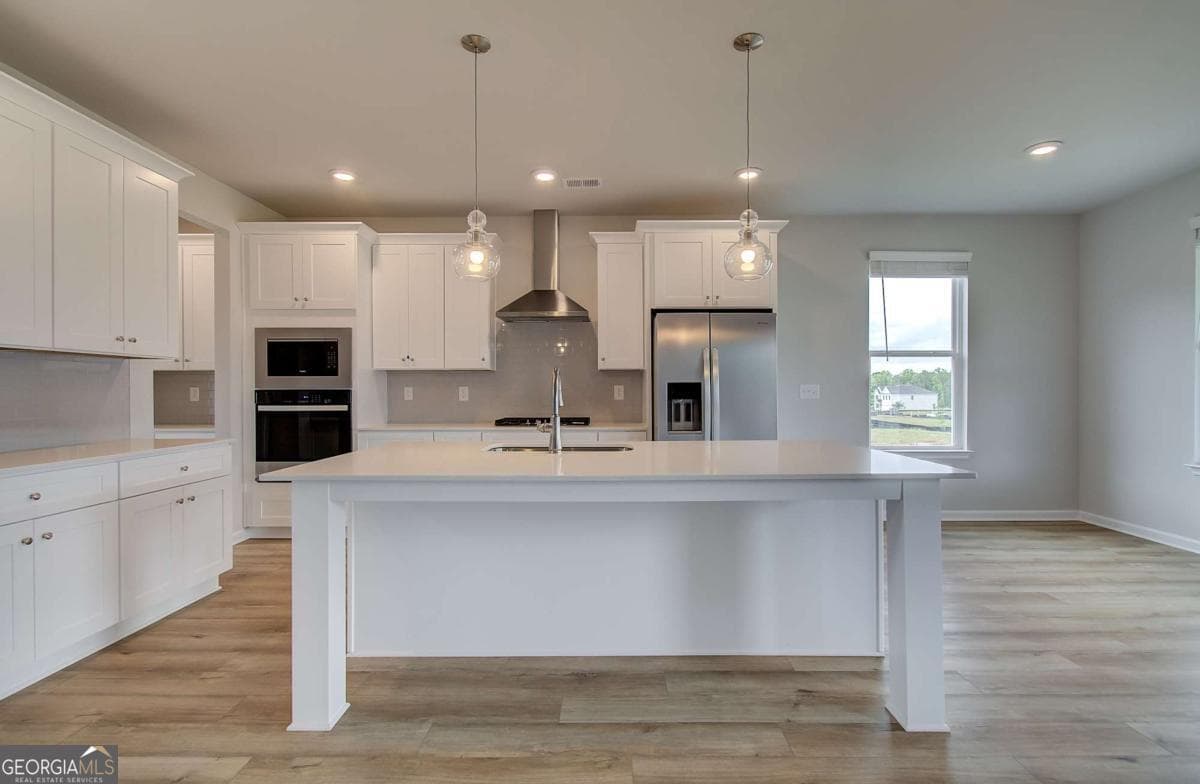 5 bedroom, 4.5 bathroom, 3,823 sq ft single family residence for sale at 708 Ripple End, Hampton, GA 30228 — photo 8