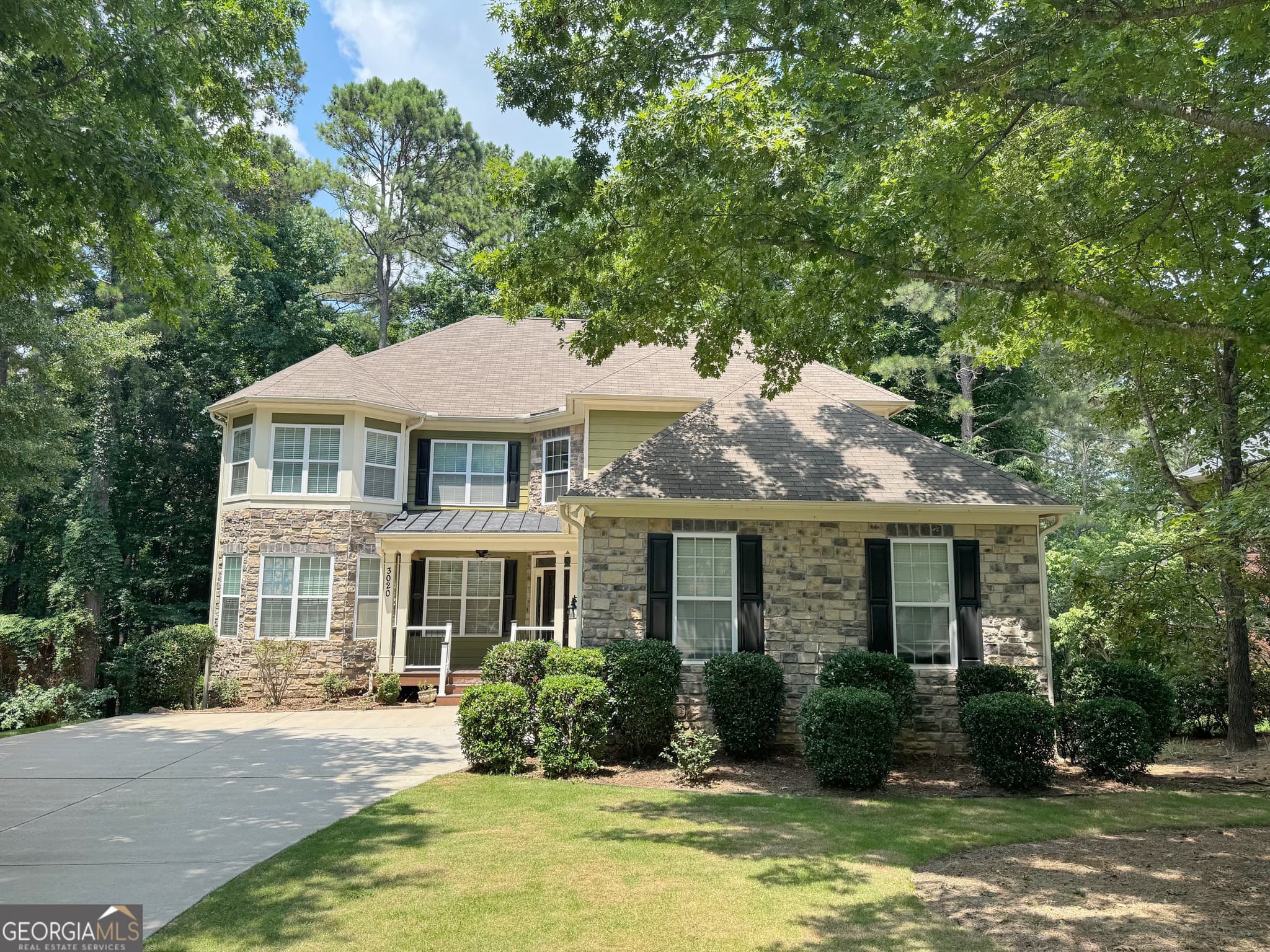 6 bedroom, 5 bathroom, 4,965 sq ft single family residence for sale at 3020 Norwell Court, Locust Grove, GA 30248 — photo 2