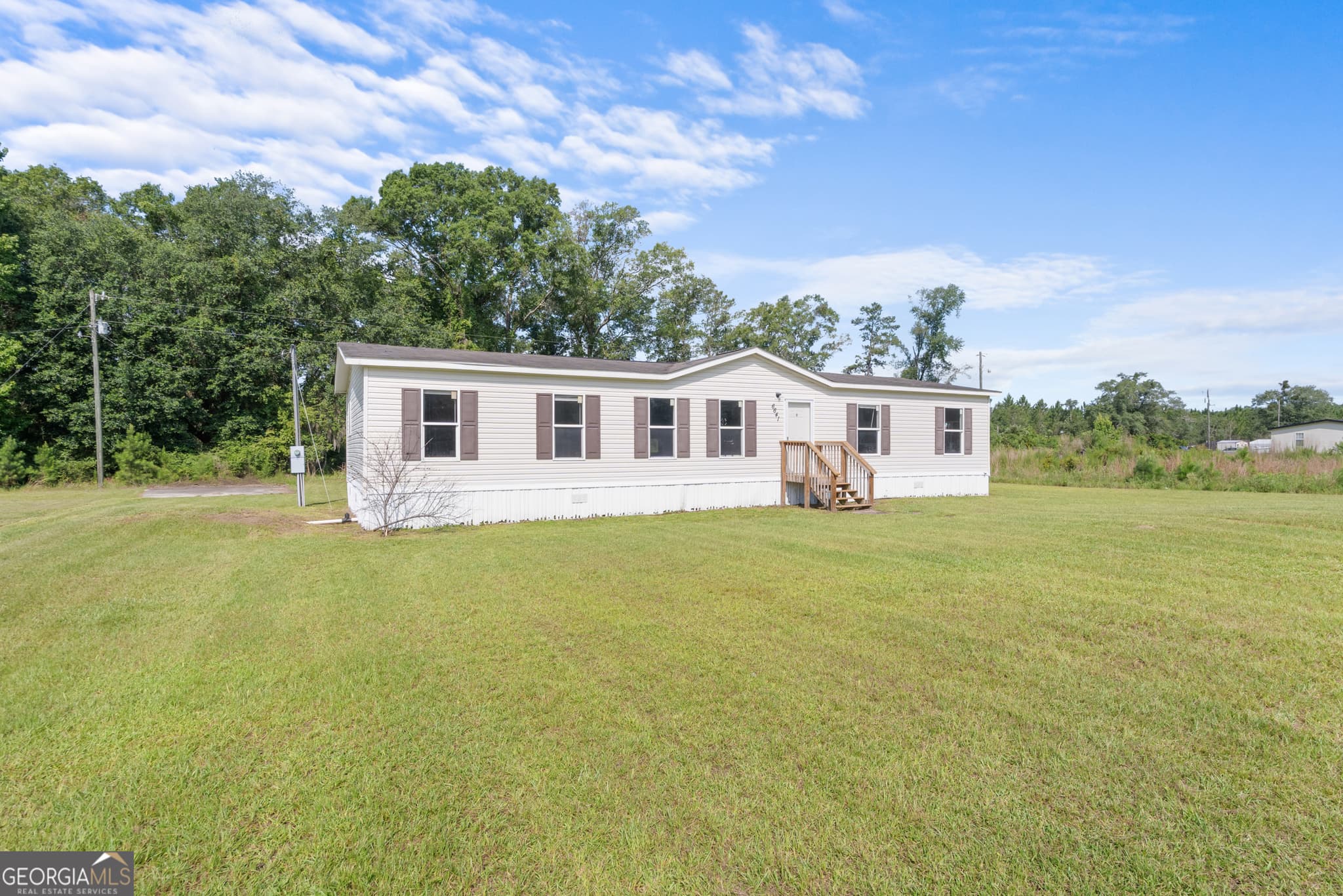 3 bedroom, 2 bathroom, 1,736 sq ft single family residence for sale at 6641 Cecil Nobles Highway, Ludowici, GA 31316 — photo 2