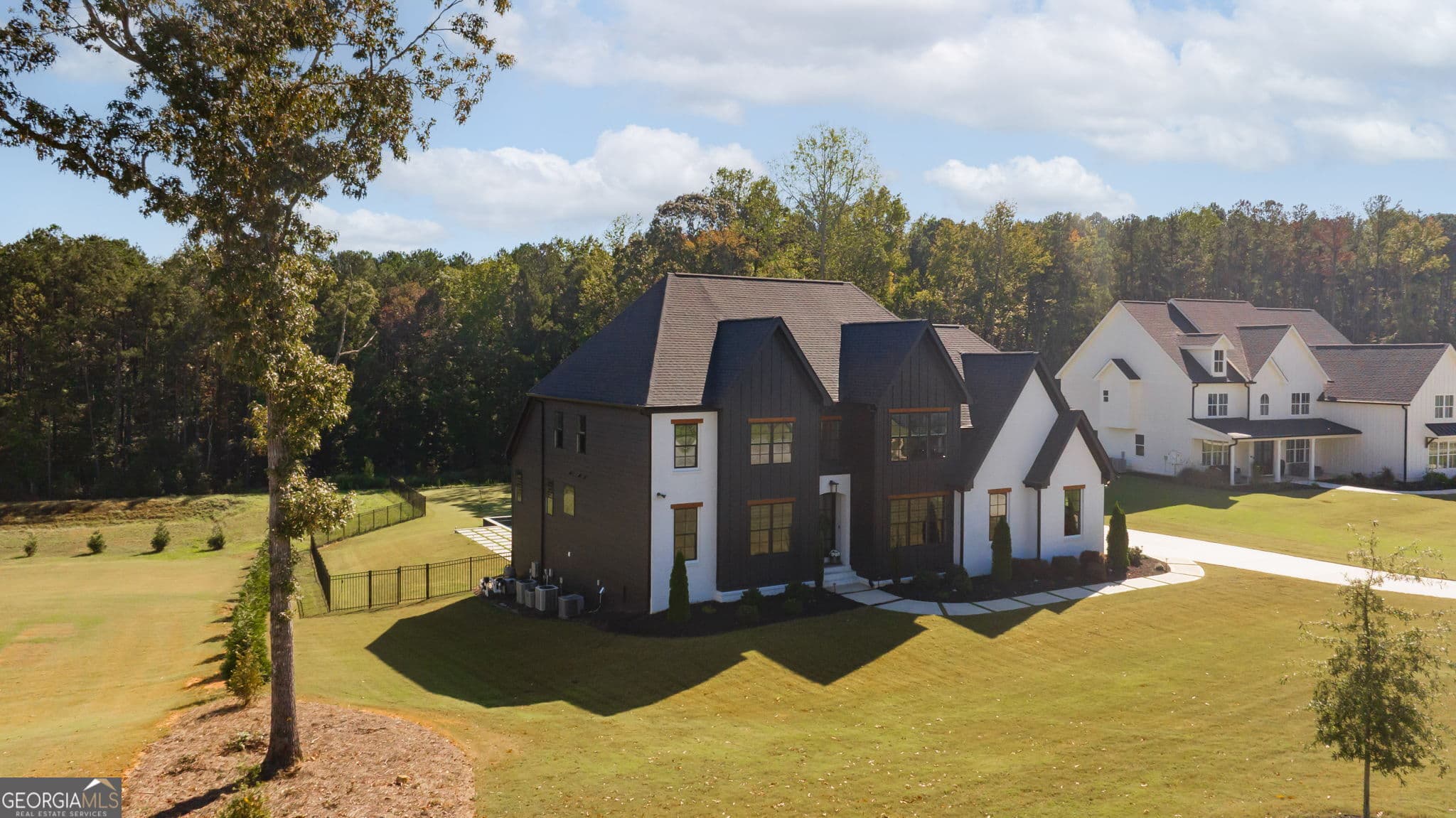7 bedroom, 6 bathroom, 7,800 sq ft single family residence for sale at 200 Cicely Way, Tyrone, GA 30290 — photo 2