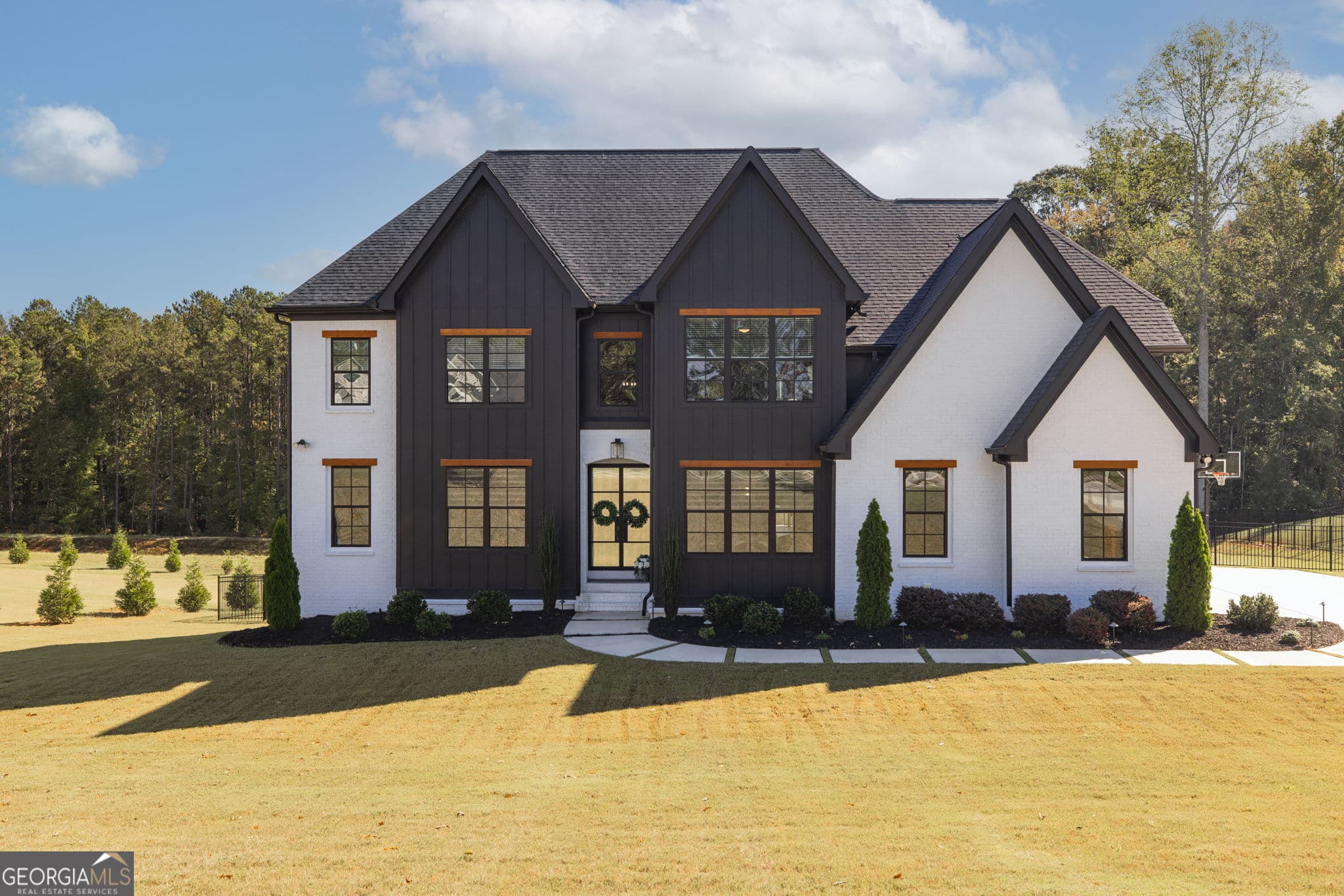 7 bedroom, 6 bathroom, 7,800 sq ft single family residence for sale at 200 Cicely Way, Tyrone, GA 30290 — photo 1 of 81