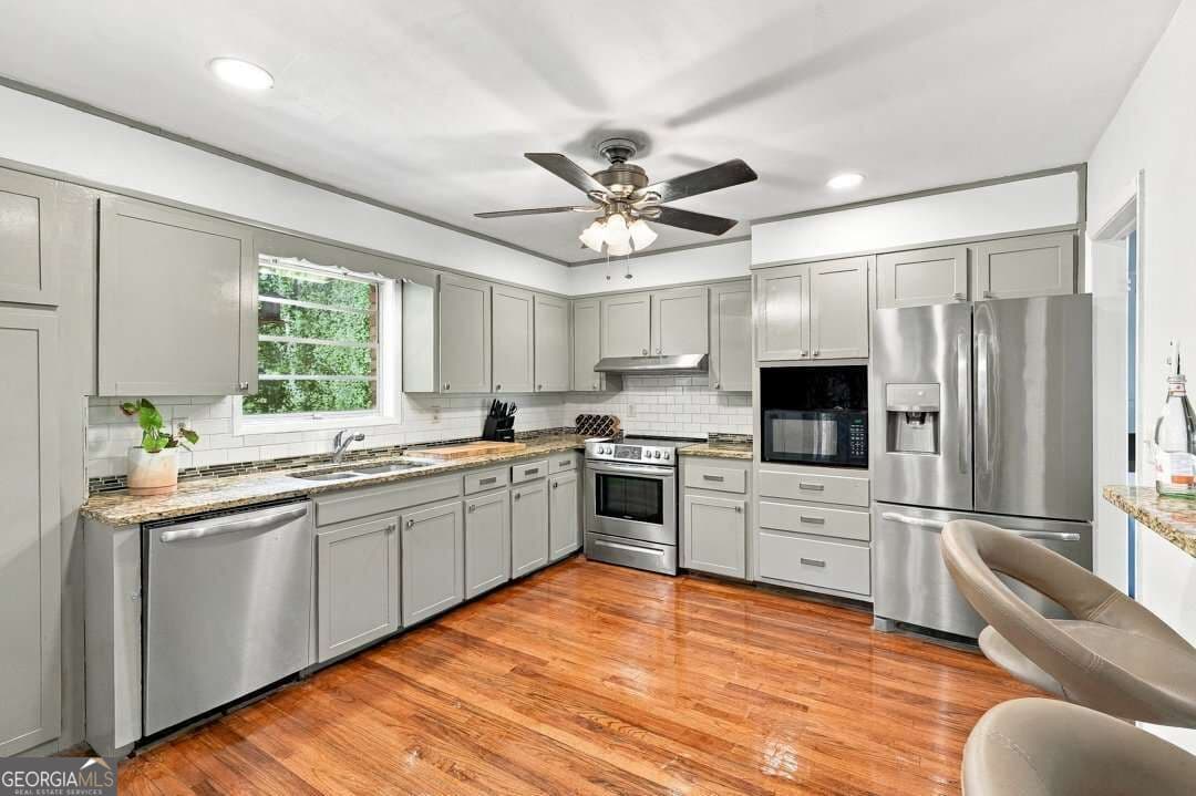 4 bedroom, 3 bathroom, 2,262 sq ft single family residence for sale at 3179 Flamingo Drive, East Point, GA 30344 — photo 6