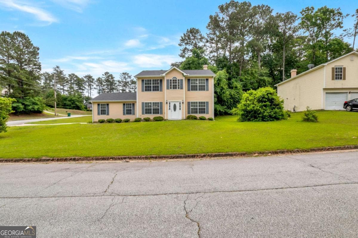4 bedroom, 2.5 bathroom, 1,832 sq ft single family residence sold at 6557 Rebecca Lou Lane, Lithonia, GA 30058