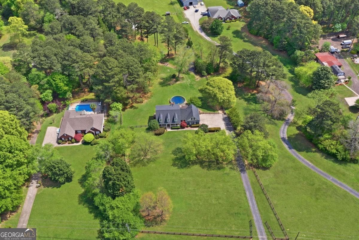6 bedroom, 4.5 bathroom, 4,432 sq ft single family residence for sale at 2380 Camp Mitchell Road, Grayson, GA 30017 — photo 6