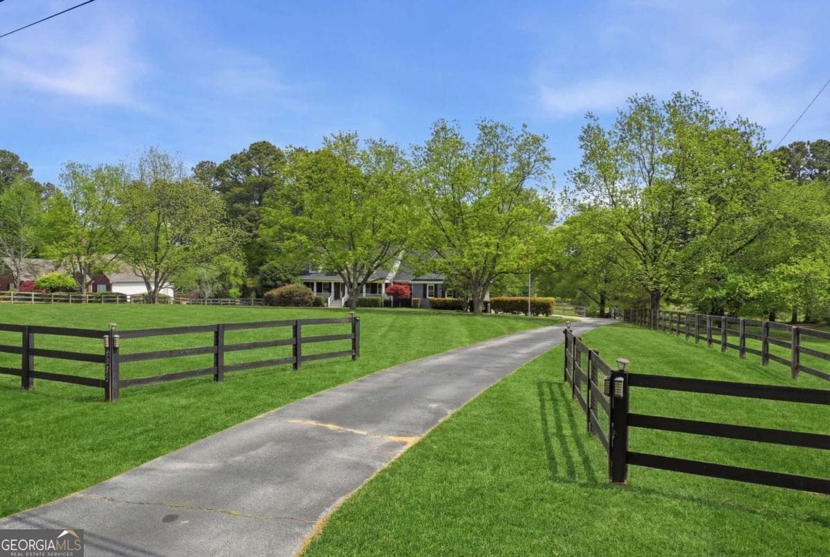 6 bedroom, 4.5 bathroom, 4,432 sq ft single family residence for sale at 2380 Camp Mitchell Road, Grayson, GA 30017 — photo 5