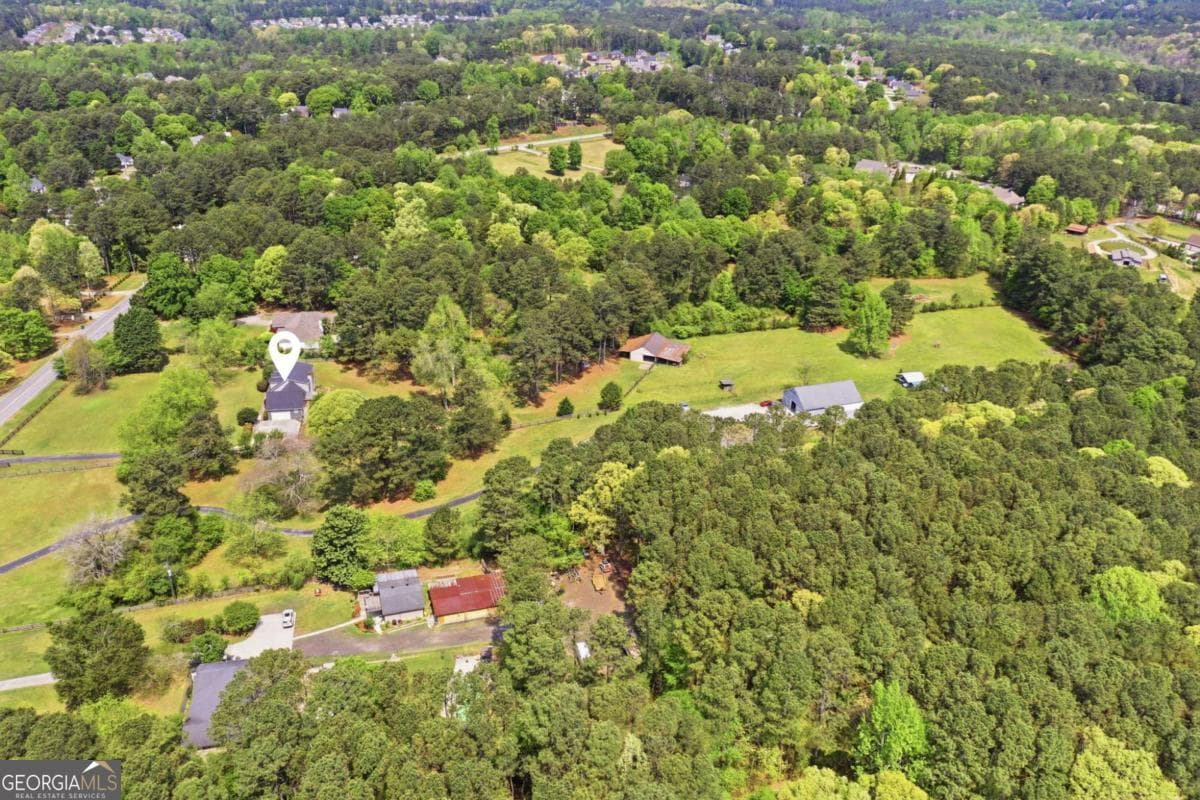 6 bedroom, 4.5 bathroom, 4,432 sq ft single family residence for sale at 2380 Camp Mitchell Road, Grayson, GA 30017 — photo 8