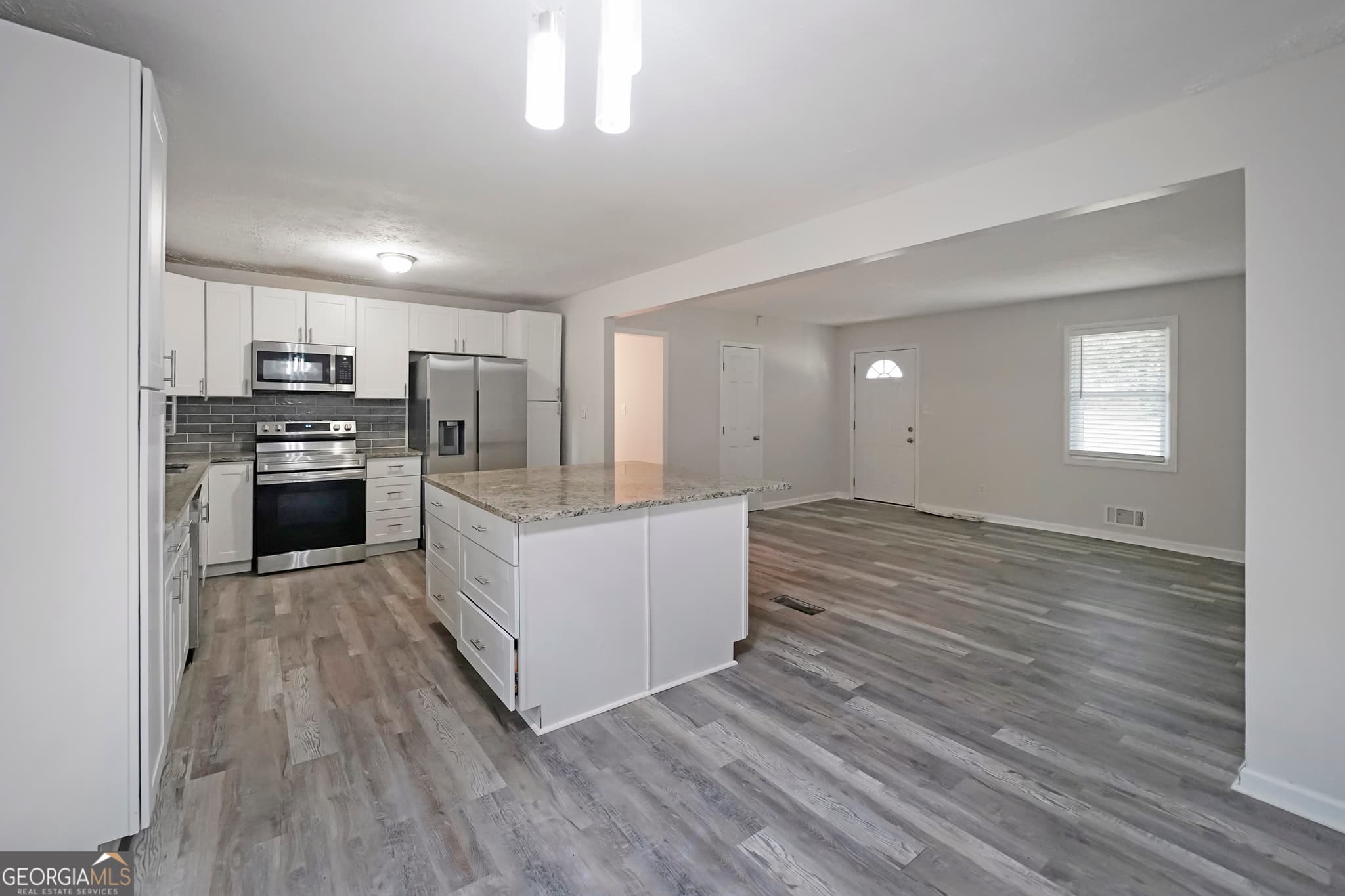 4 bedroom, 3 bathroom, 1,750 sq ft single family residence for sale at 3021 Lakeridge Drive, Conyers, GA 30094 — photo 6