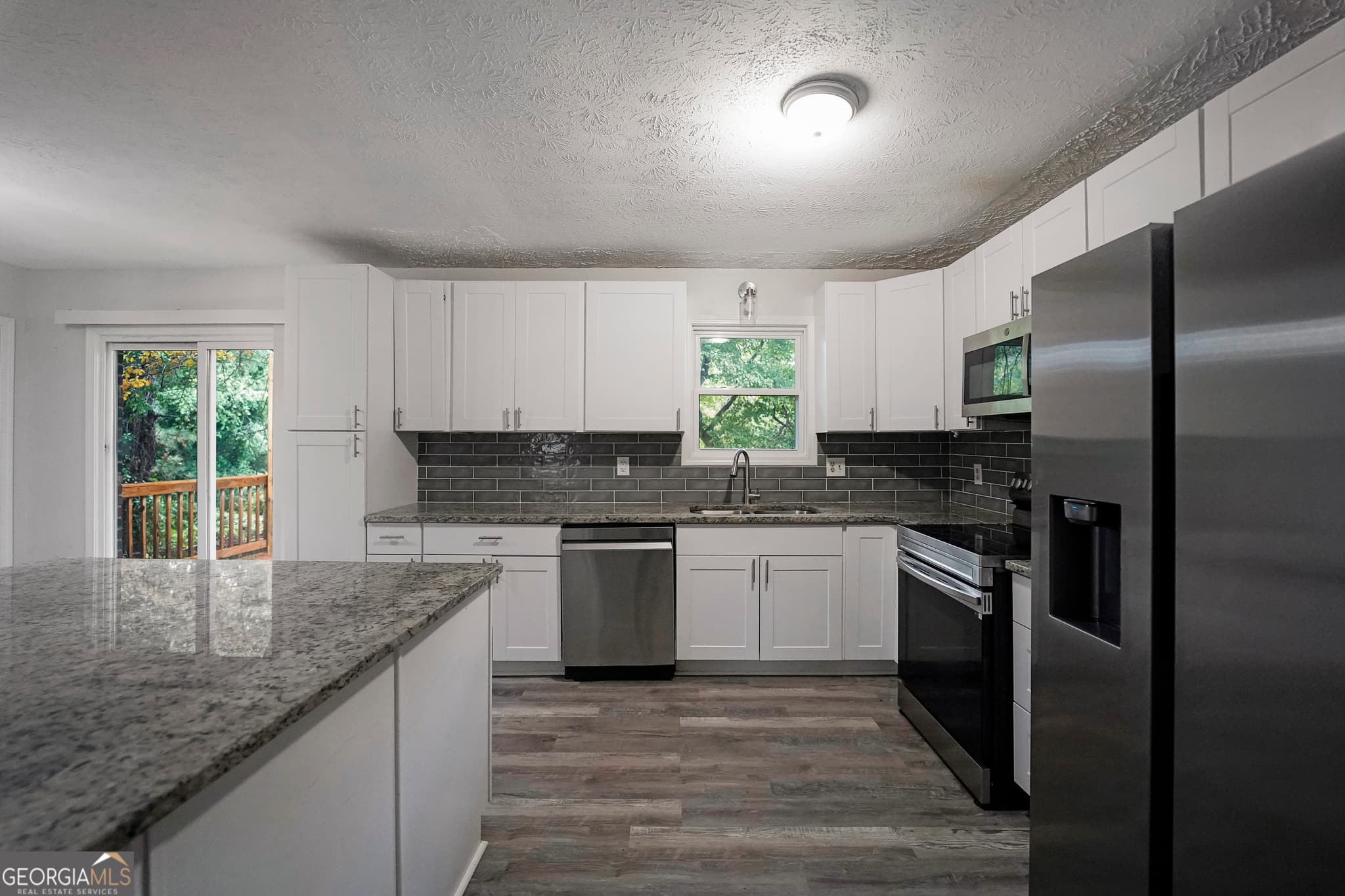 4 bedroom, 3 bathroom, 1,750 sq ft single family residence for sale at 3021 Lakeridge Drive, Conyers, GA 30094 — photo 7