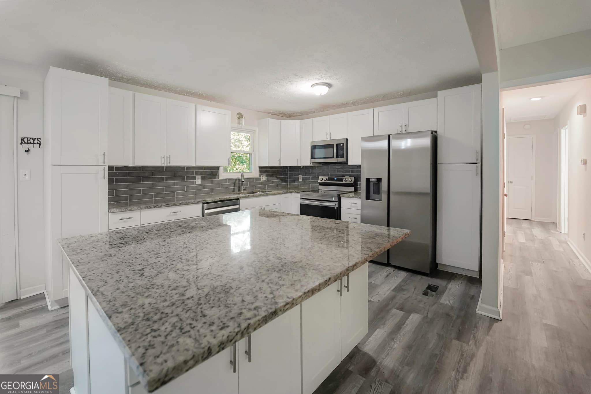 4 bedroom, 3 bathroom, 1,750 sq ft single family residence for sale at 3021 Lakeridge Drive, Conyers, GA 30094 — photo 8