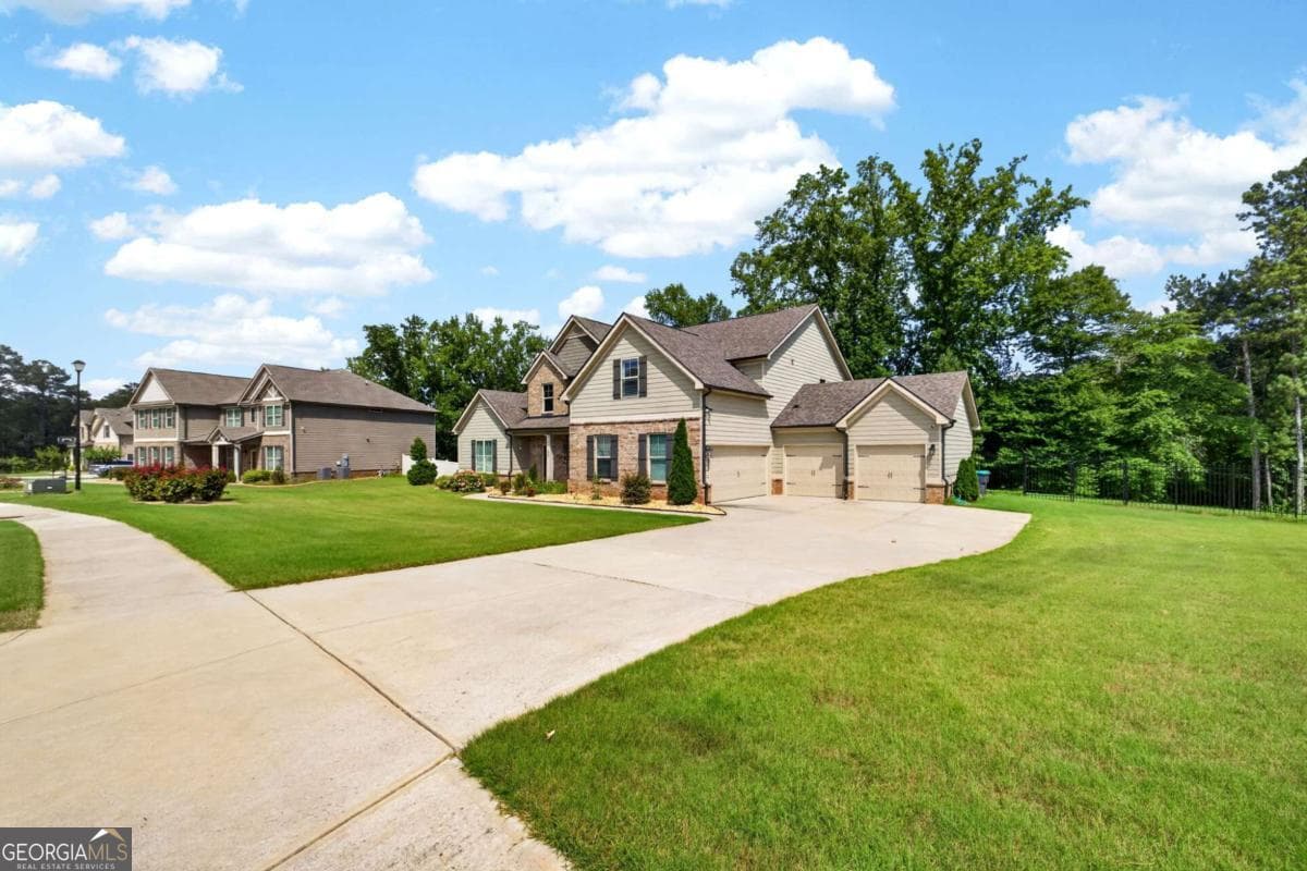 5 bedroom, 3.5 bathroom, 3,810 sq ft single family residence for sale at 208 Seth Terrace, Mcdonough, GA 30252 — photo 3
