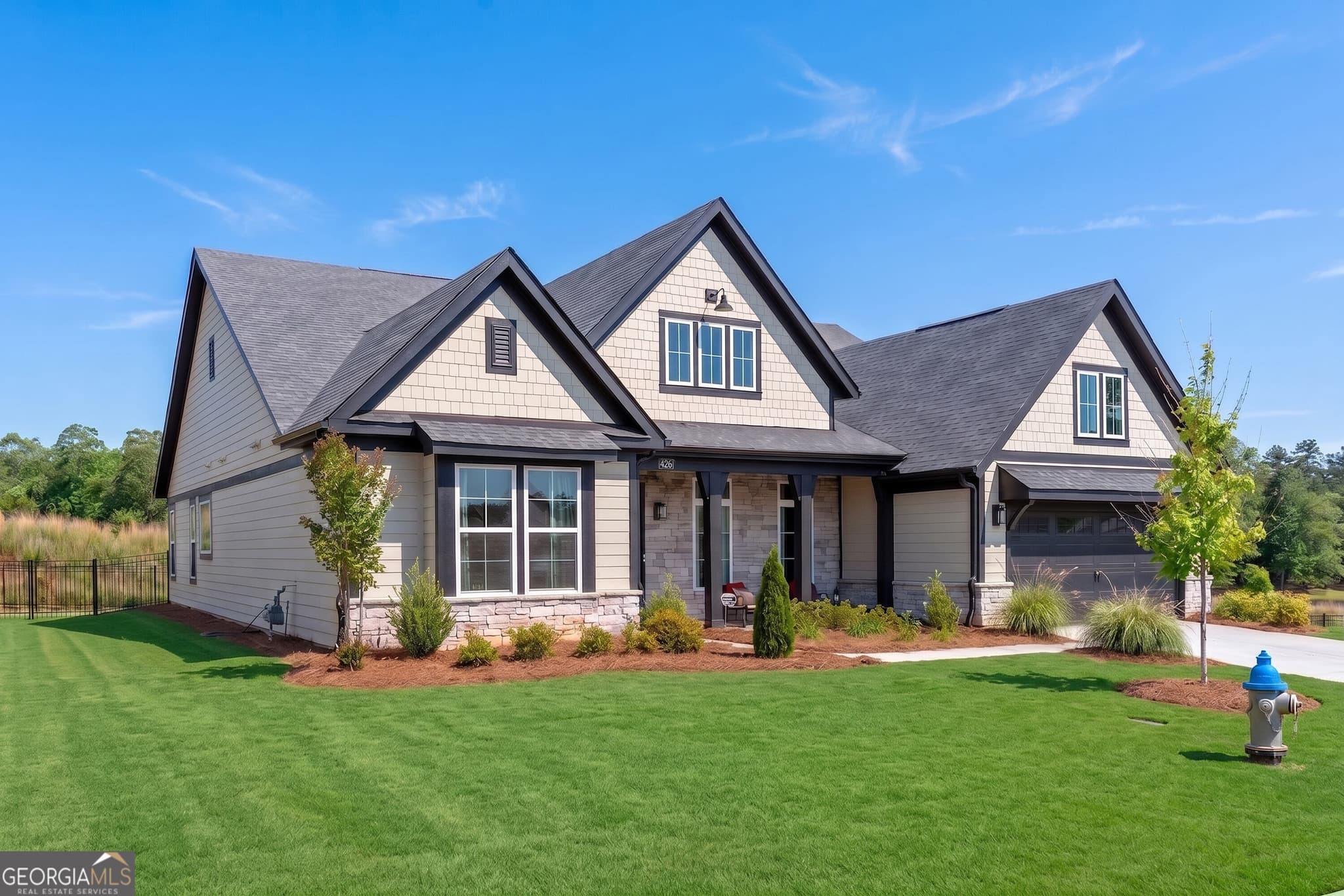 4 bedroom, 3 bathroom, 2,715 sq ft single family residence for sale at 426 Clear Lake Parkway, Hoschton, GA 30548 — photo 2
