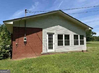 3 bedroom, 1.5 bathroom, 1,597 sq ft single family residence for sale at 1190 Asphalt Rock Road, Cherokee, AL 35616 — photo 6