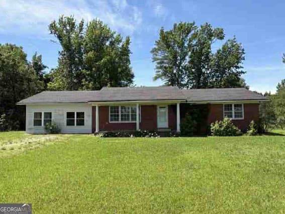 3 bedroom, 1.5 bathroom, 1,597 sq ft single family residence for sale at 1190 Asphalt Rock Road, Cherokee, AL 35616 — photo 1 of 13
