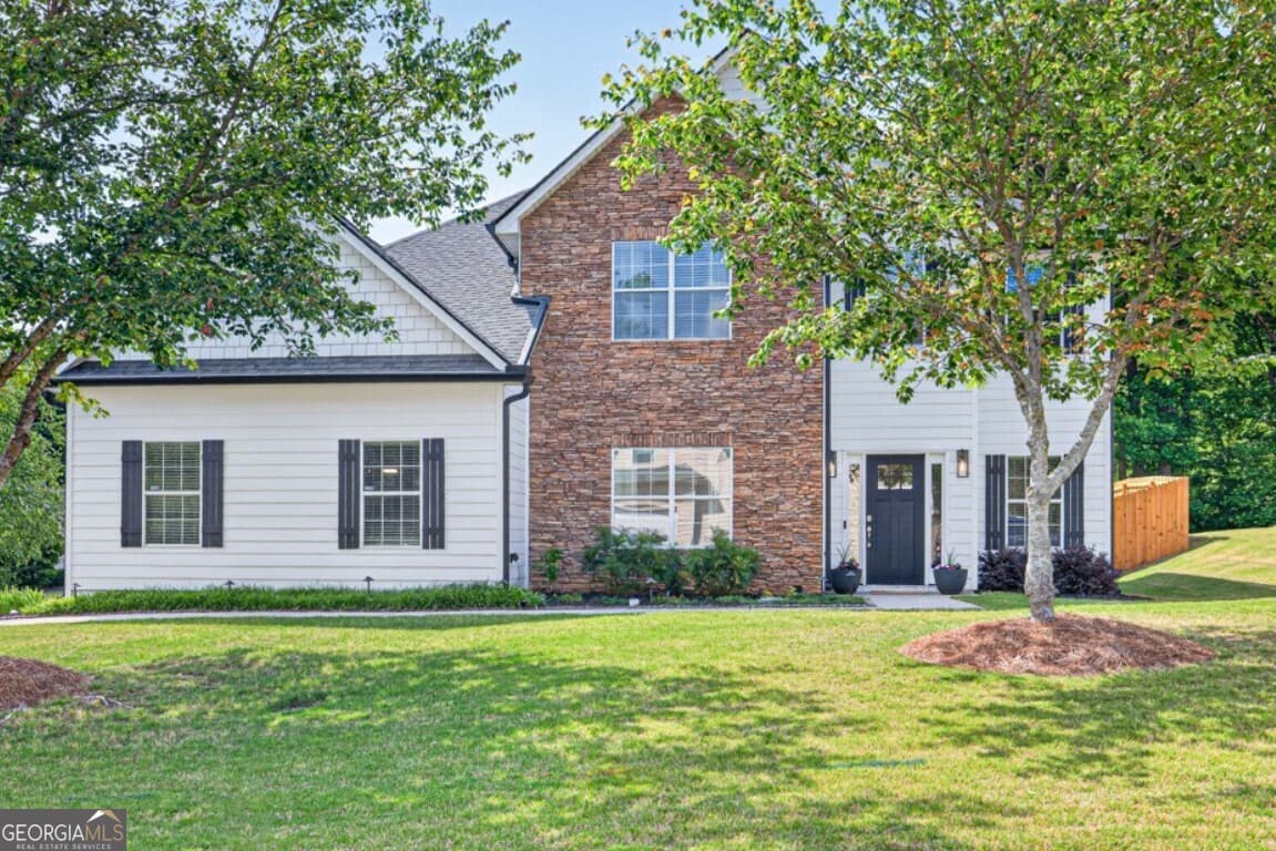 4 bedroom, 3.5 bathroom, 3,129 sq ft single family residence sold at 306 Farmbrook Pass, Canton, GA 30115