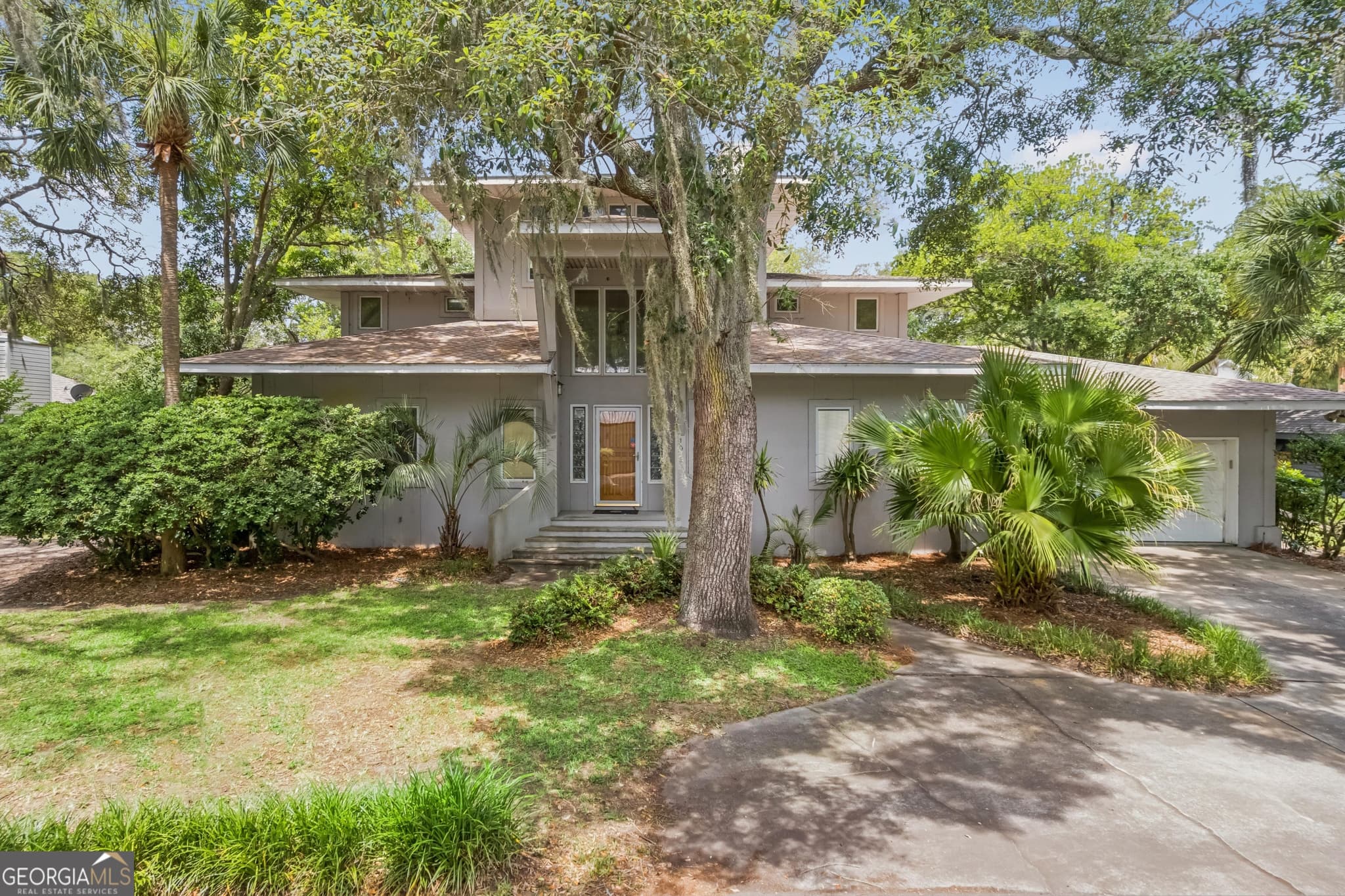 3 bedroom, 3.5 bathroom, 3,100 sq ft single family residence for sale at 107 Sandcastle Way, St. Simons, GA 31522 — photo 1 of 49