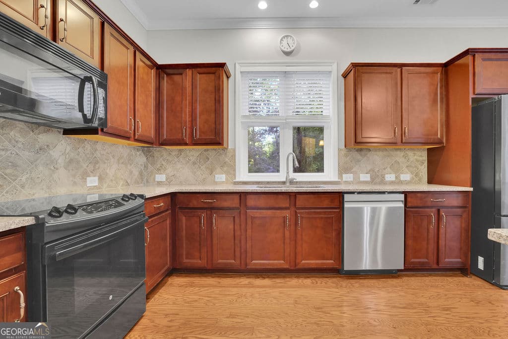 4 bedroom, 2.5 bathroom, 2,680 sq ft single family residence for sale at 519 Huntington Drive, Ball Ground, GA 30107 — photo 6