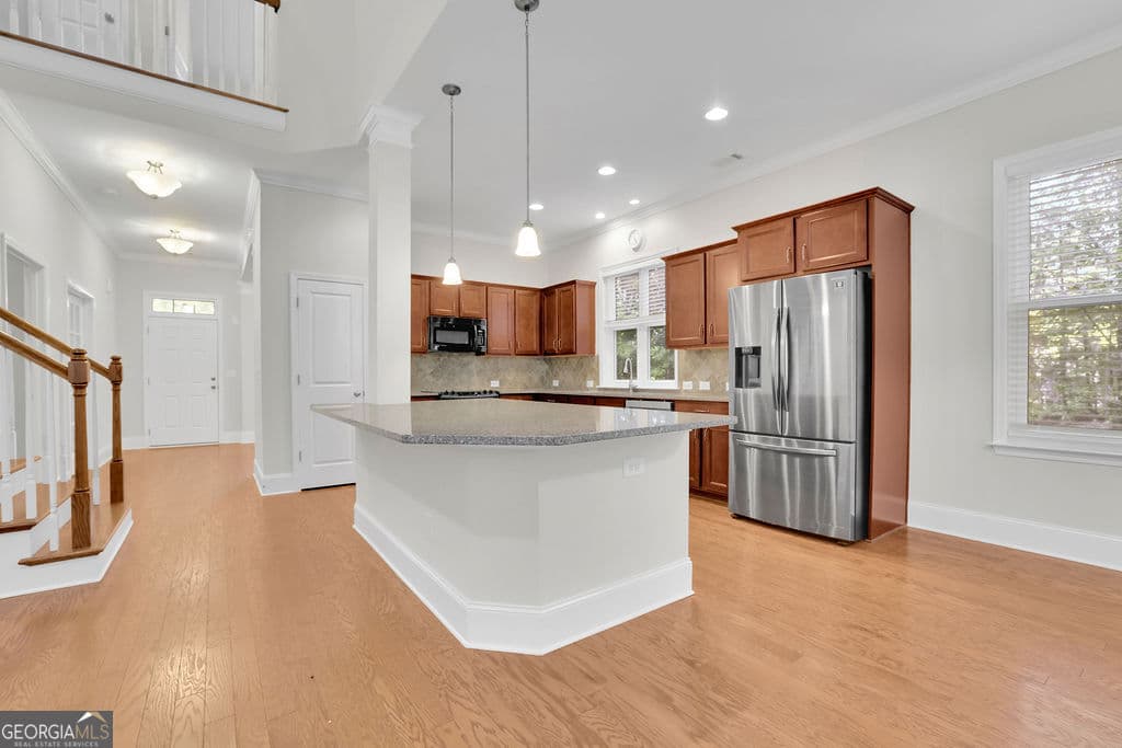 4 bedroom, 2.5 bathroom, 2,680 sq ft single family residence for sale at 519 Huntington Drive, Ball Ground, GA 30107 — photo 4