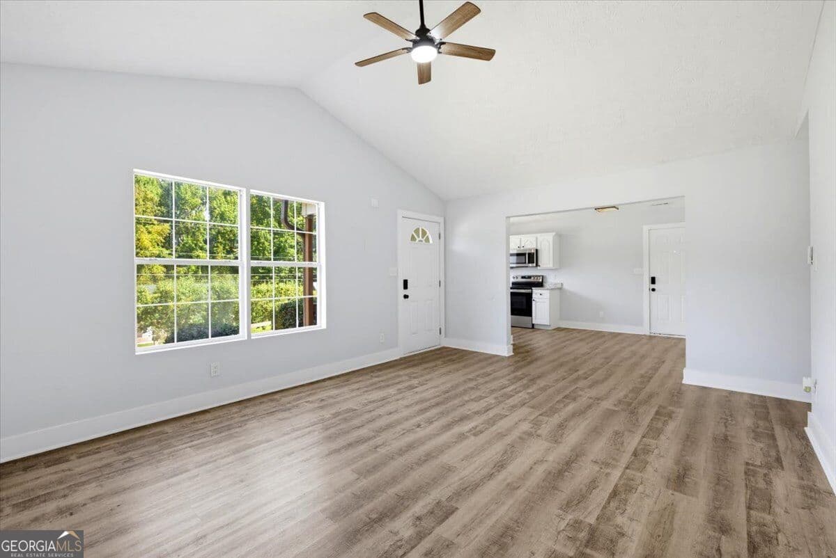 3 bedroom, 2 bathroom, 1,335 sq ft single family residence for sale at 910 Winterside Lane, Atlanta, GA 30349 — photo 5