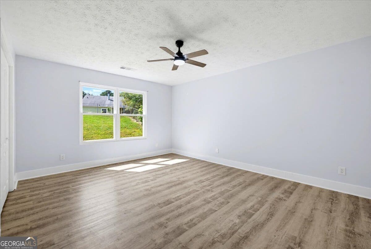 3 bedroom, 2 bathroom, 1,335 sq ft single family residence for sale at 910 Winterside Lane, Atlanta, GA 30349 — photo 9