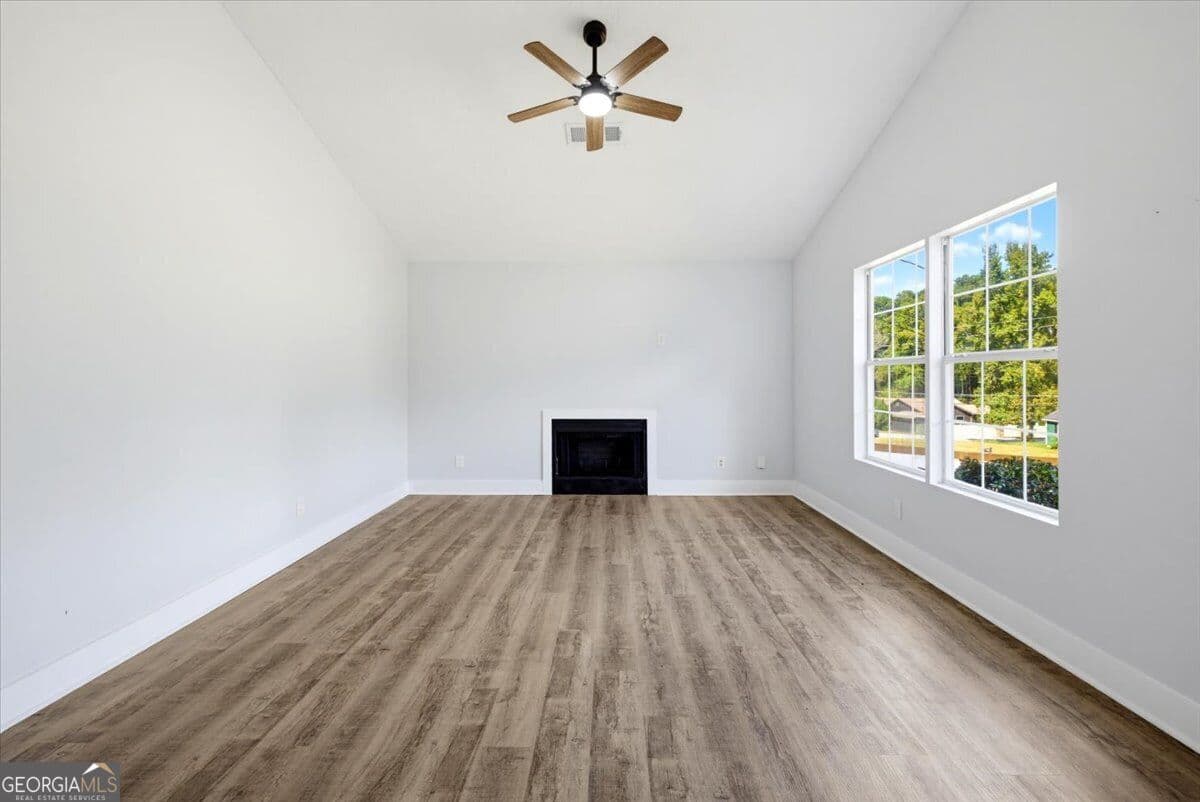 3 bedroom, 2 bathroom, 1,335 sq ft single family residence for sale at 910 Winterside Lane, Atlanta, GA 30349 — photo 4