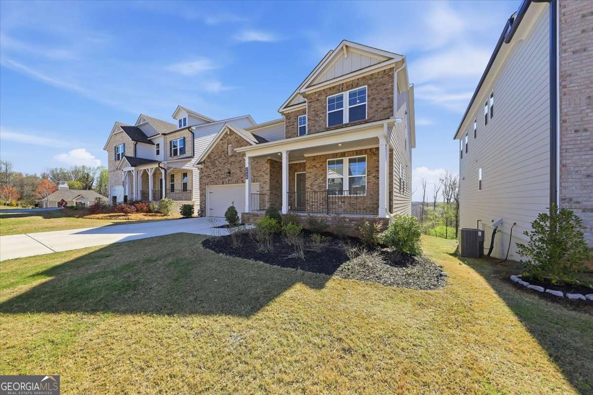 5 bedroom, 4.5 bathroom, 3,632 sq ft single family residence for sale at 3939 Alderstone Drive, Flowery Branch, GA 30542 — photo 3