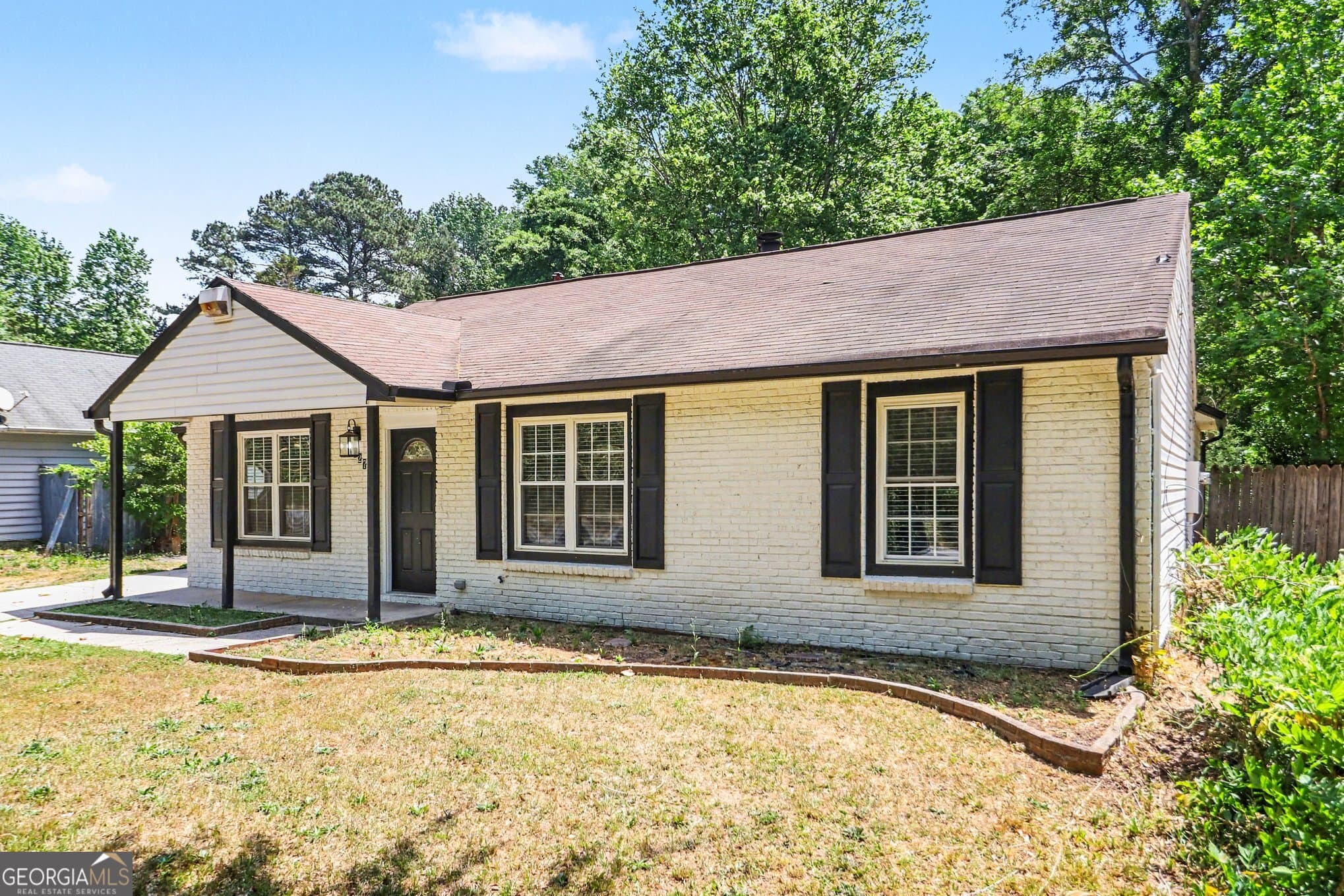 4 bedroom, 2 bathroom, 1,342 sq ft single family residence for sale at 627 Towngate Boulevard, Jonesboro, GA 30238 — photo 3