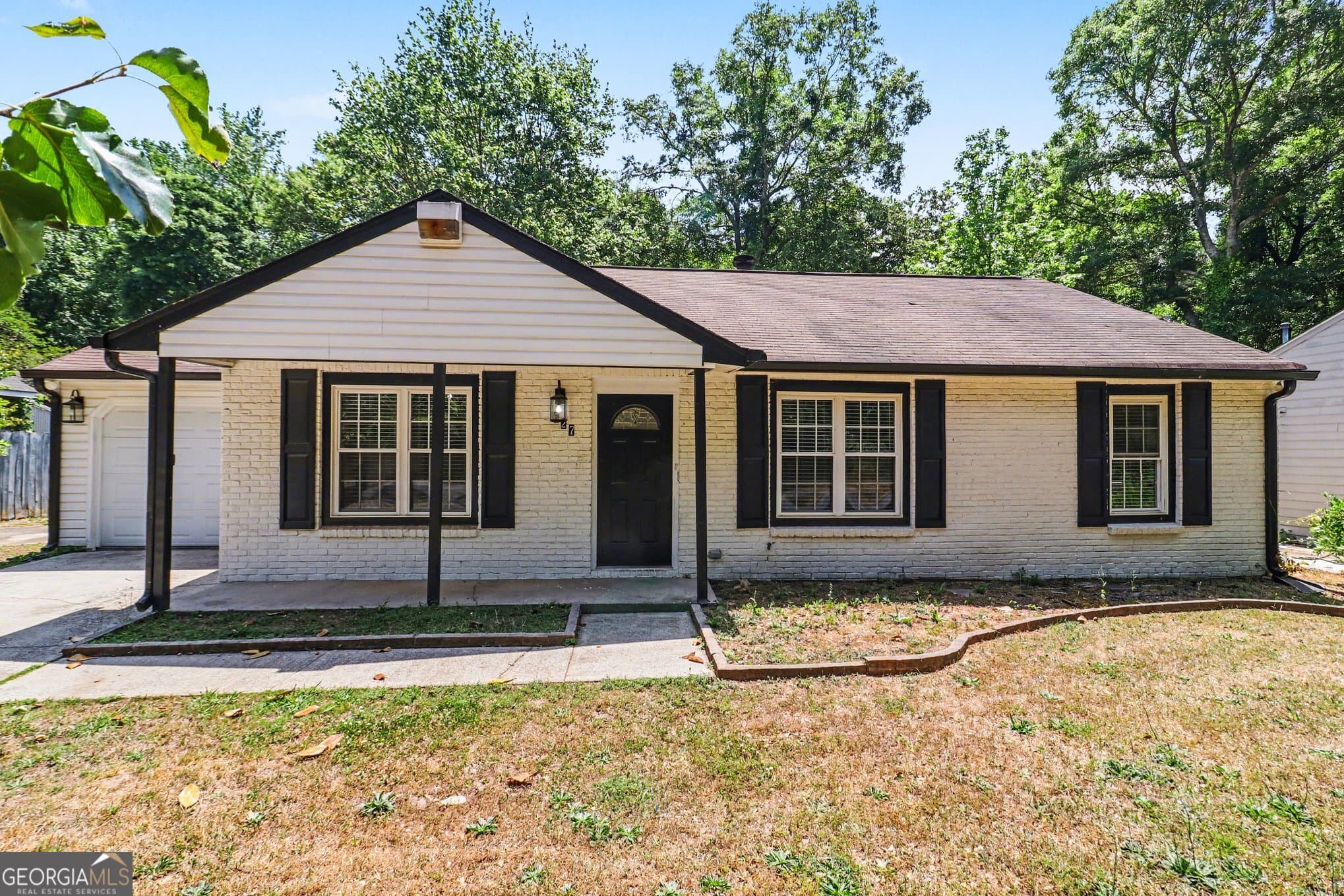 4 bedroom, 2 bathroom, 1,342 sq ft single family residence for sale at 627 Towngate Boulevard, Jonesboro, GA 30238