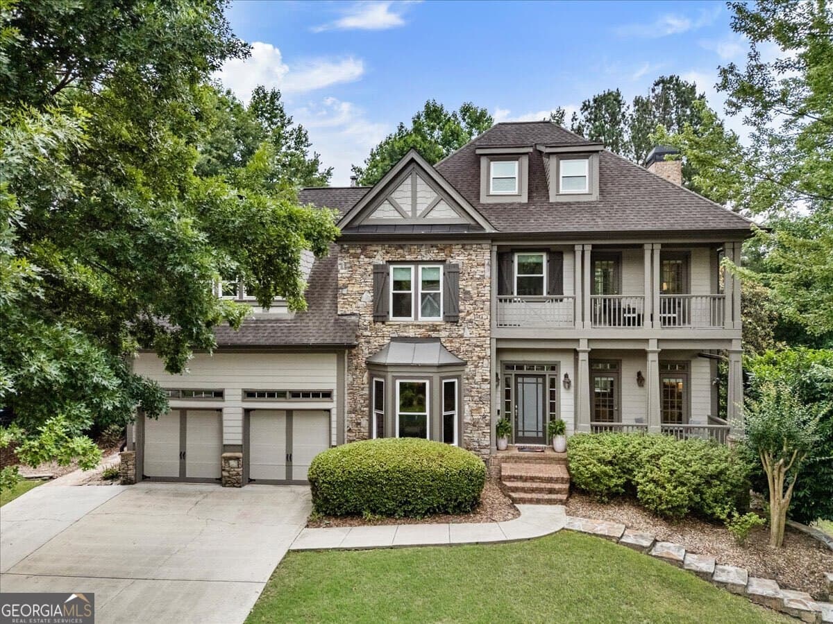 6 bedroom, 4 bathroom, 4,848 sq ft single family residence sold at 6082 Grand Loop Road, Sugar Hill, GA 30518