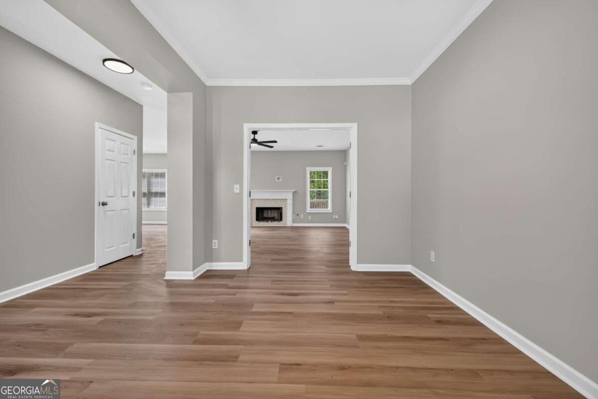 4 bedroom, 2.5 bathroom, 2,585 sq ft single family residence for sale at 1312 Woodland View Road, Lawrenceville, GA 30043 — photo 6