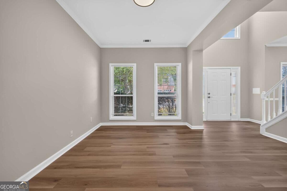 4 bedroom, 2.5 bathroom, 2,585 sq ft single family residence for sale at 1312 Woodland View Road, Lawrenceville, GA 30043 — photo 5