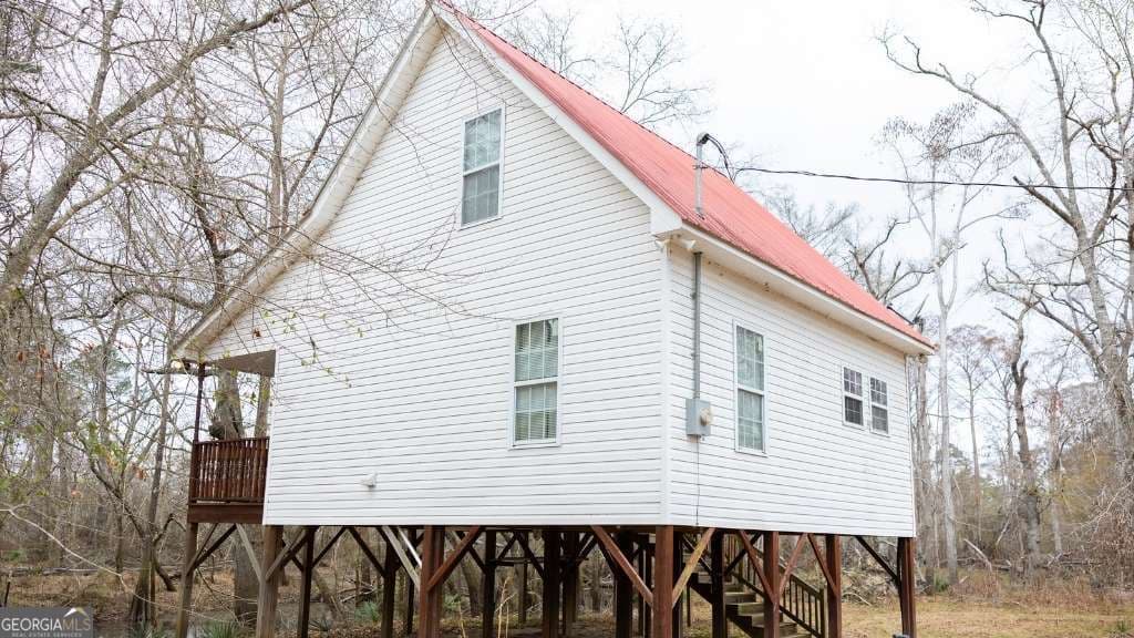2 bedroom, 1 bathroom, 1,032 sq ft cabin,single family residence for sale at 5230 Coleman Bridge SPUR, Cobbtown, GA 30420 — photo 9