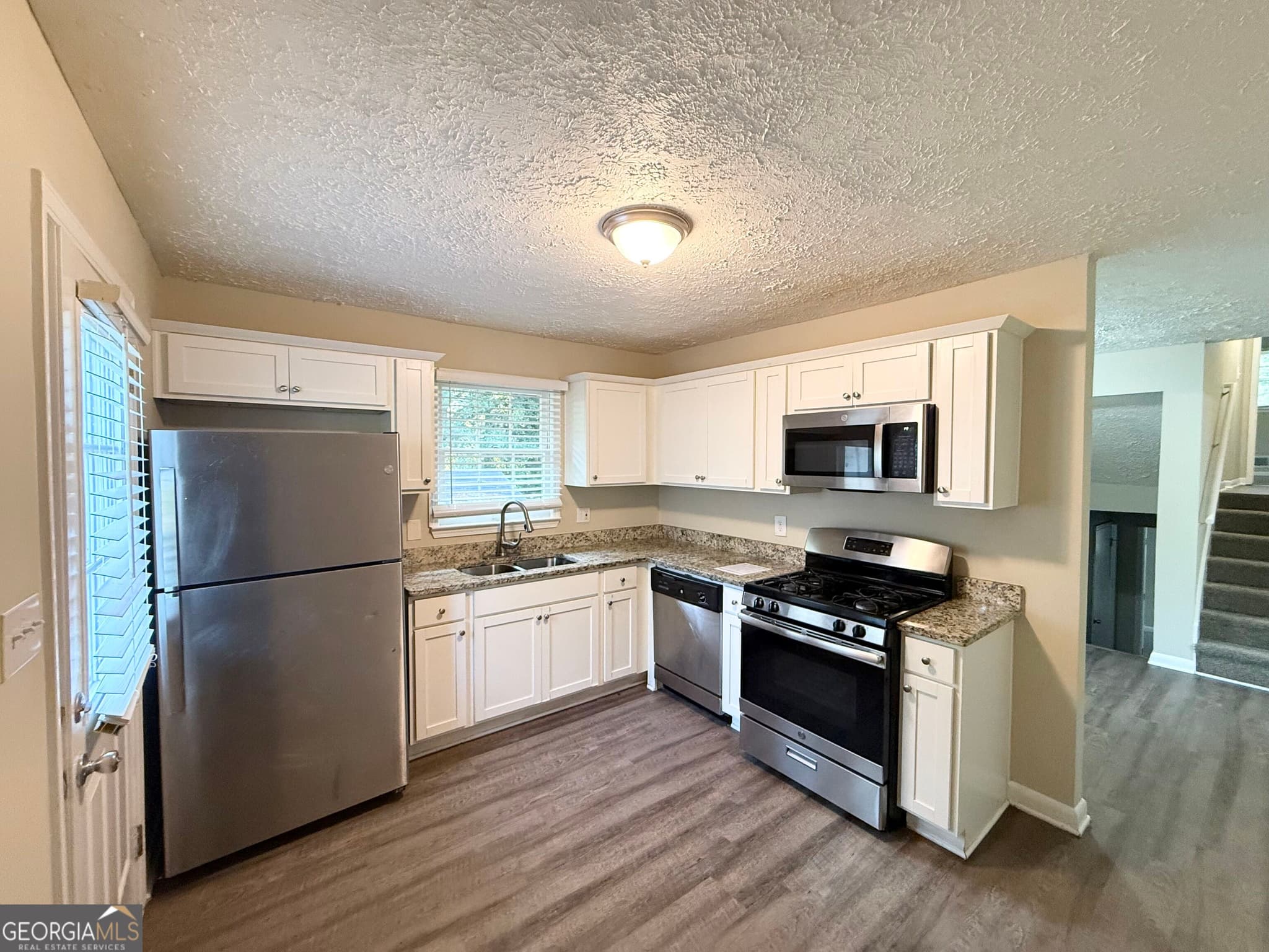 4 bedroom, 2.5 bathroom, 1,175 sq ft single family residence for sale at 6350 Connell Road, South Fulton, GA 30349 — photo 5