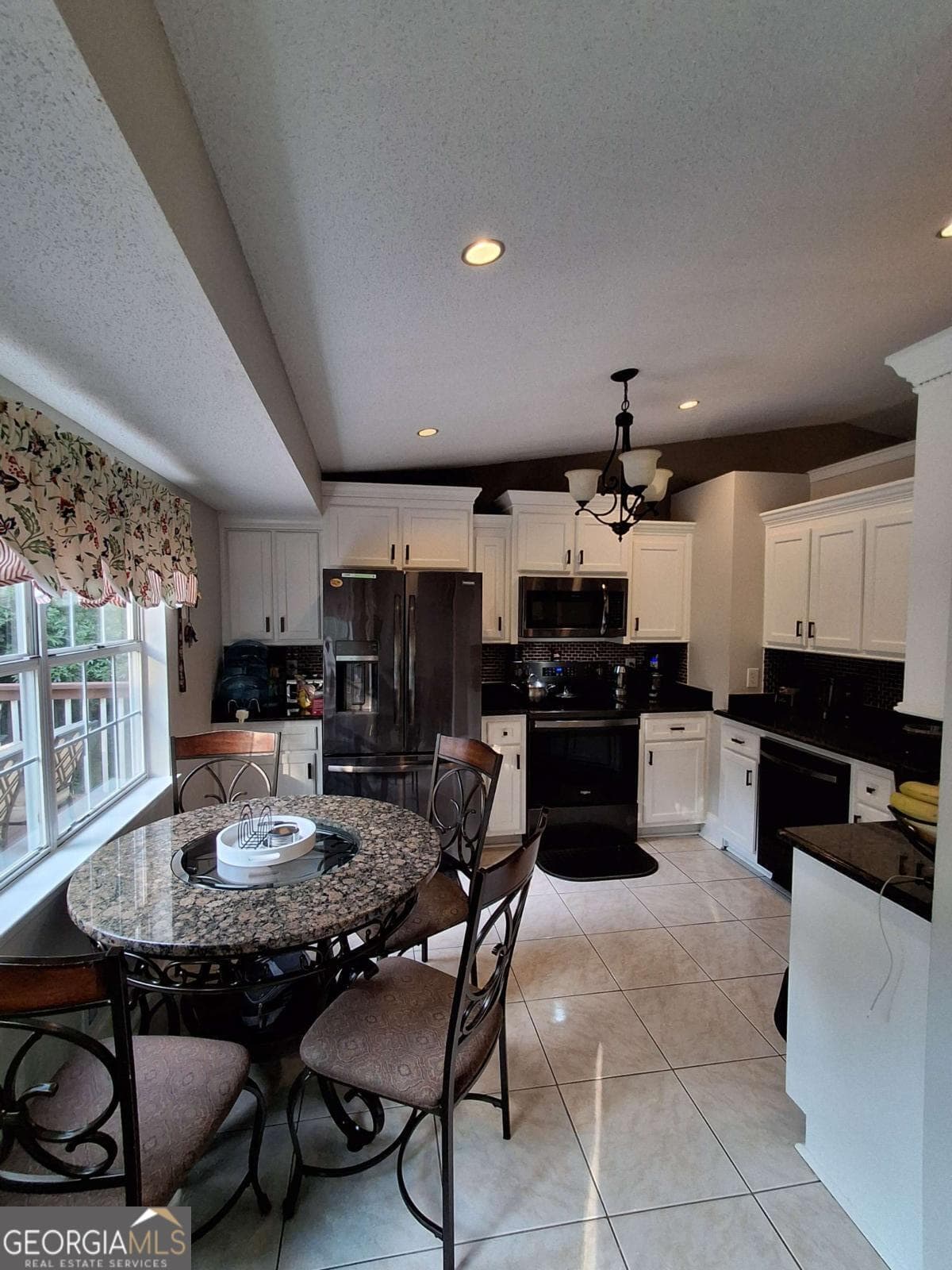4 bedroom, 3 bathroom single family residence for rent at 1142 Riverside Trace, Buford, GA 30518 for $2,300 a month — photo 4