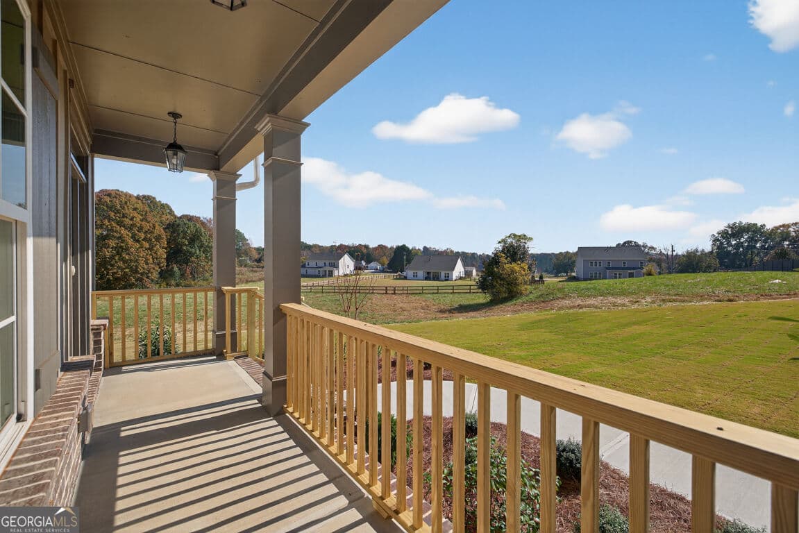 5 bedroom, 4.5 bathroom, 3,213 sq ft single family residence for sale at 8845 jot em down Road, Gainesville, GA 30506 — photo 6