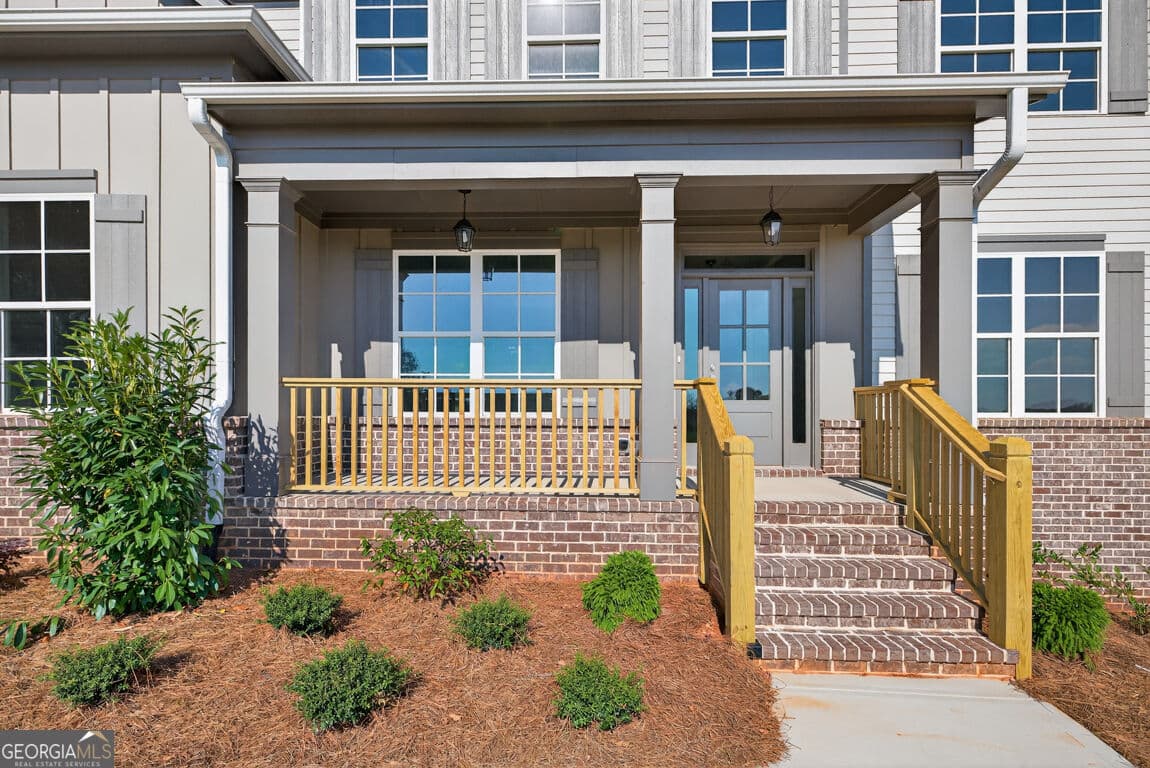 5 bedroom, 4.5 bathroom, 3,213 sq ft single family residence for sale at 8845 jot em down Road, Gainesville, GA 30506 — photo 5
